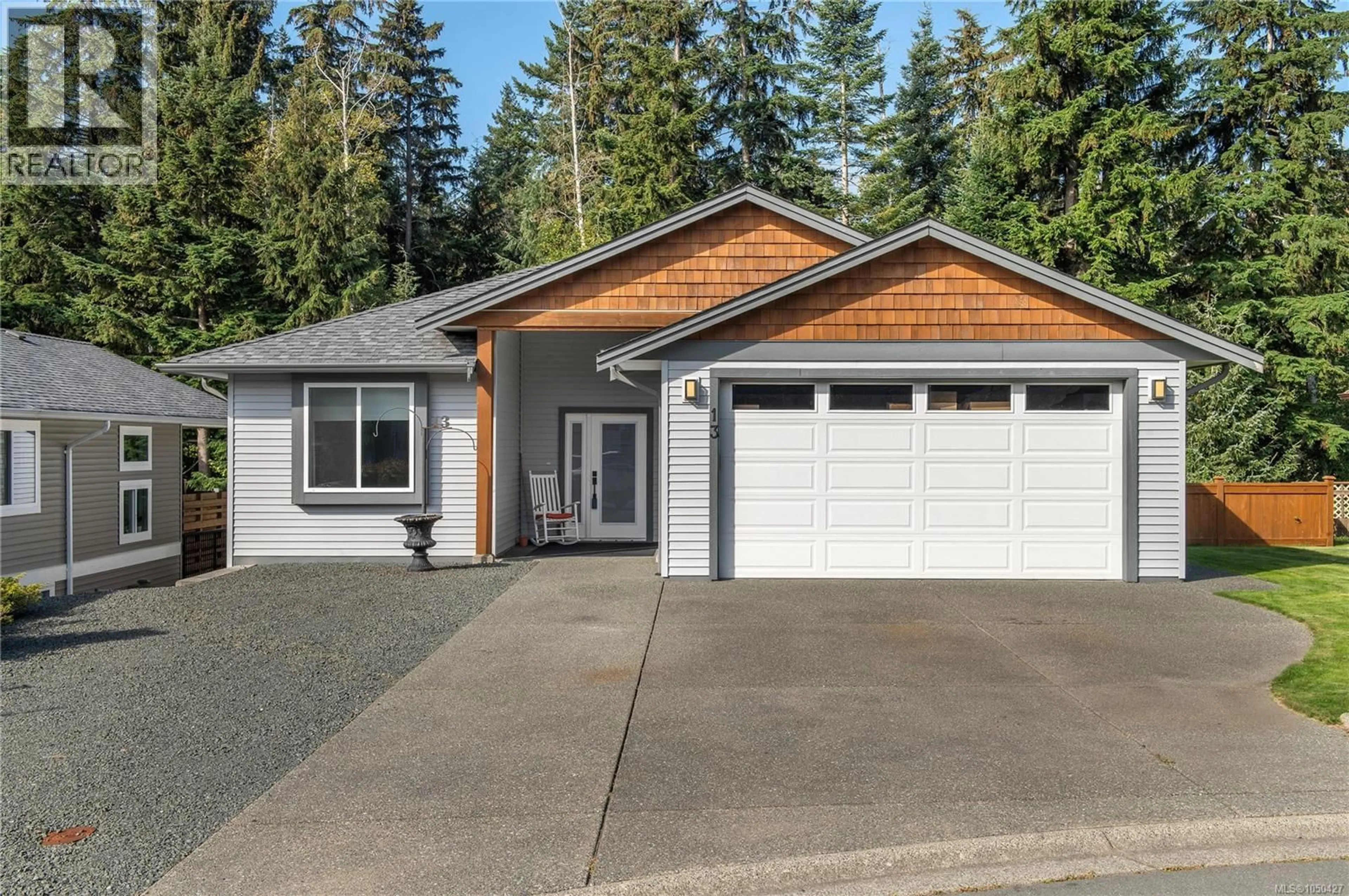 Home with vinyl exterior material, street for 13 - 100 MCPHEDRAN ROAD, Campbell River British Columbia V9W5P4