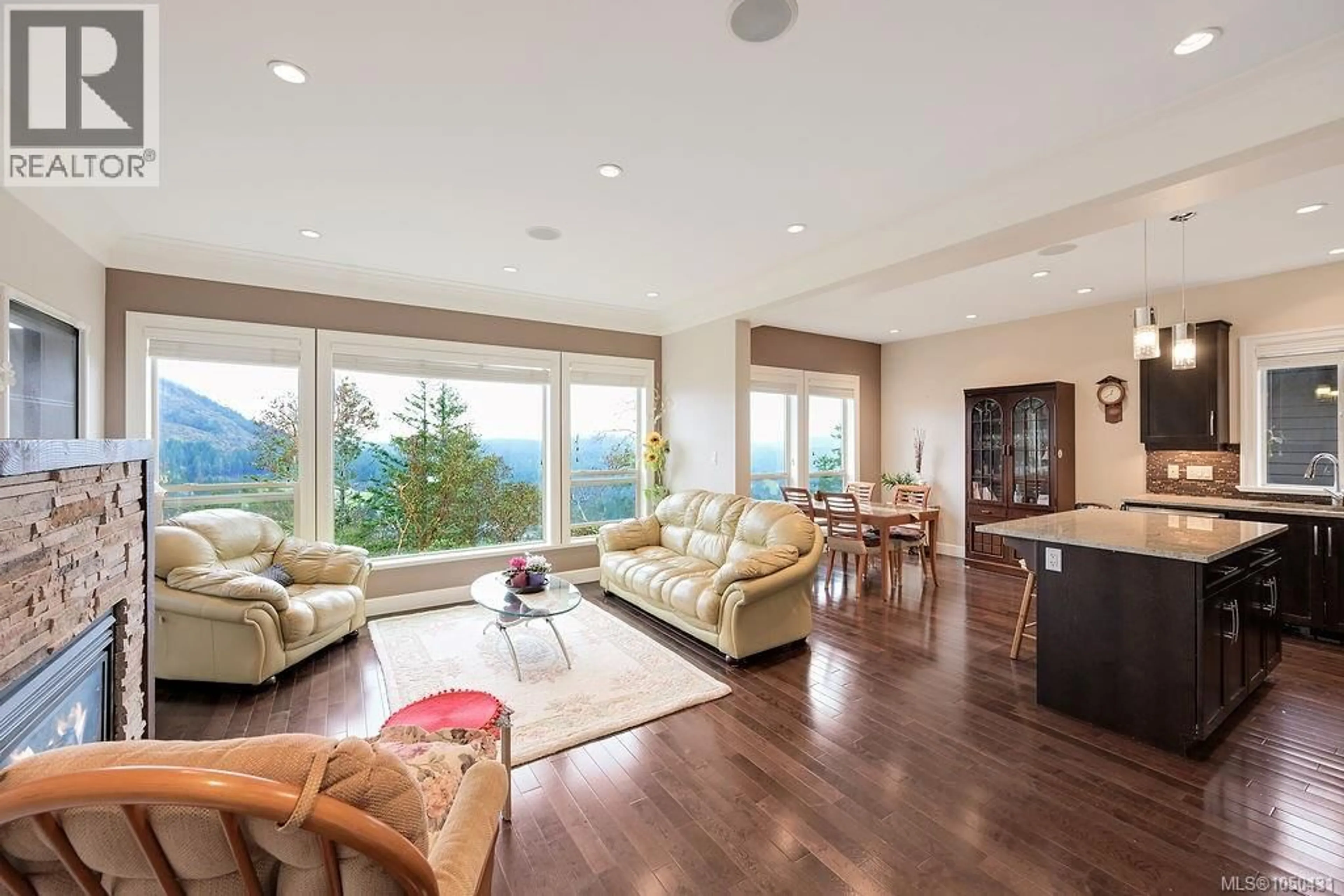 Living room with furniture, wood/laminate floor for 110 - 1177 DEERVIEW PLACE, Langford British Columbia V9B0B3