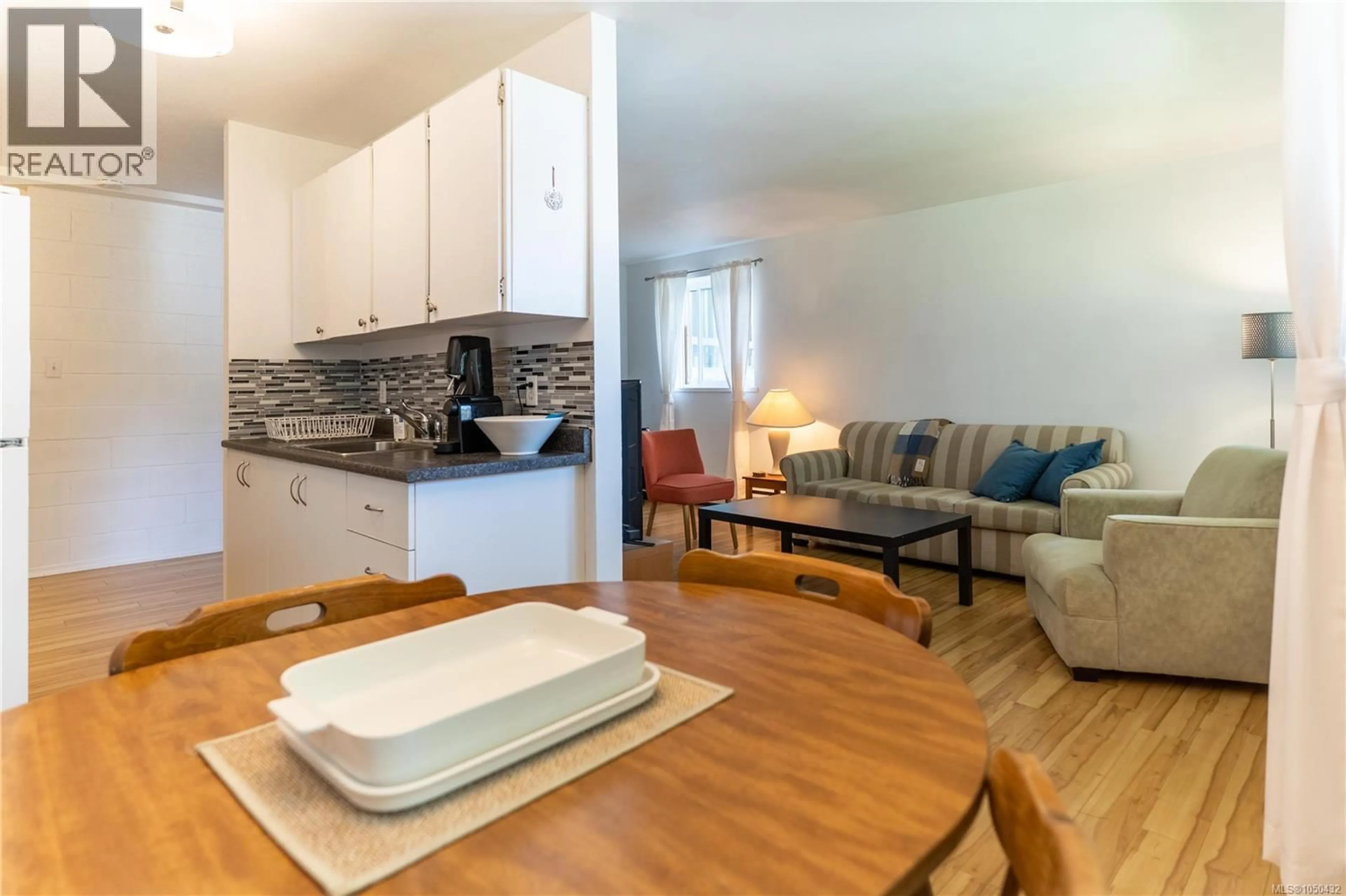Open concept kitchen, wood/laminate floor for 2107 - 1007 BOWEN ROAD, Nanaimo British Columbia V9R2A4