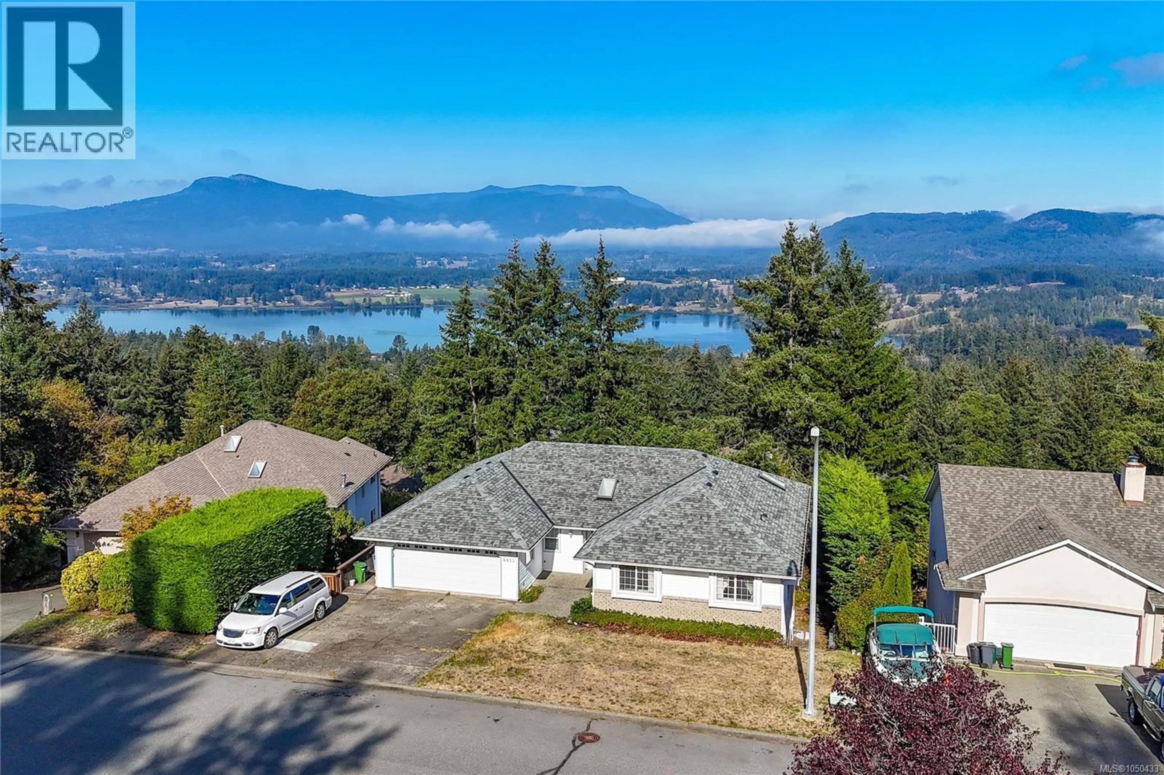 A pic from outside/outdoor area/front of a property/back of a property/a pic from drone, mountain view for 6033 CHIPPEWA ROAD, Duncan British Columbia V9L5P5