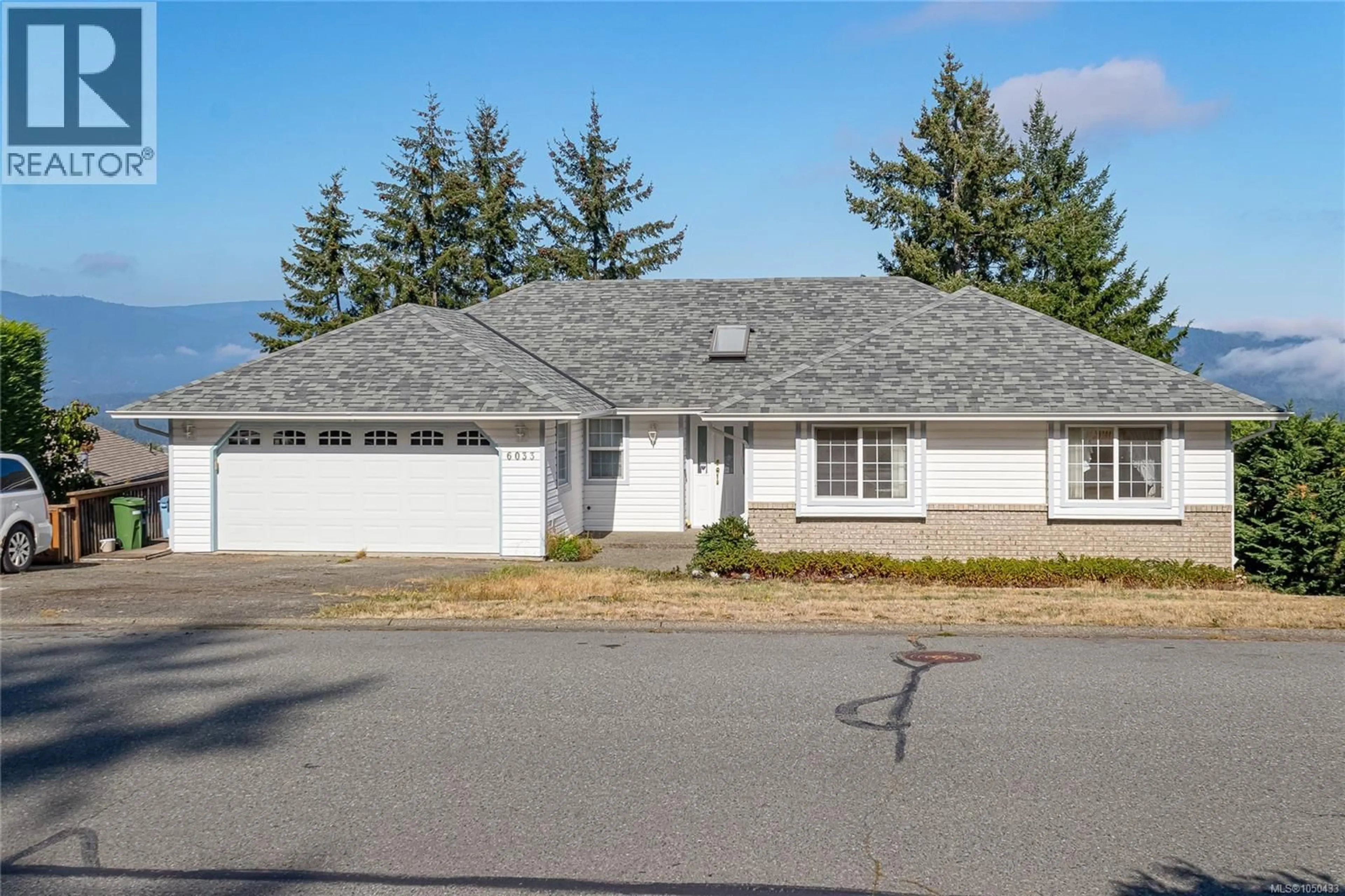 Home with vinyl exterior material, street for 6033 CHIPPEWA ROAD, Duncan British Columbia V9L5P5