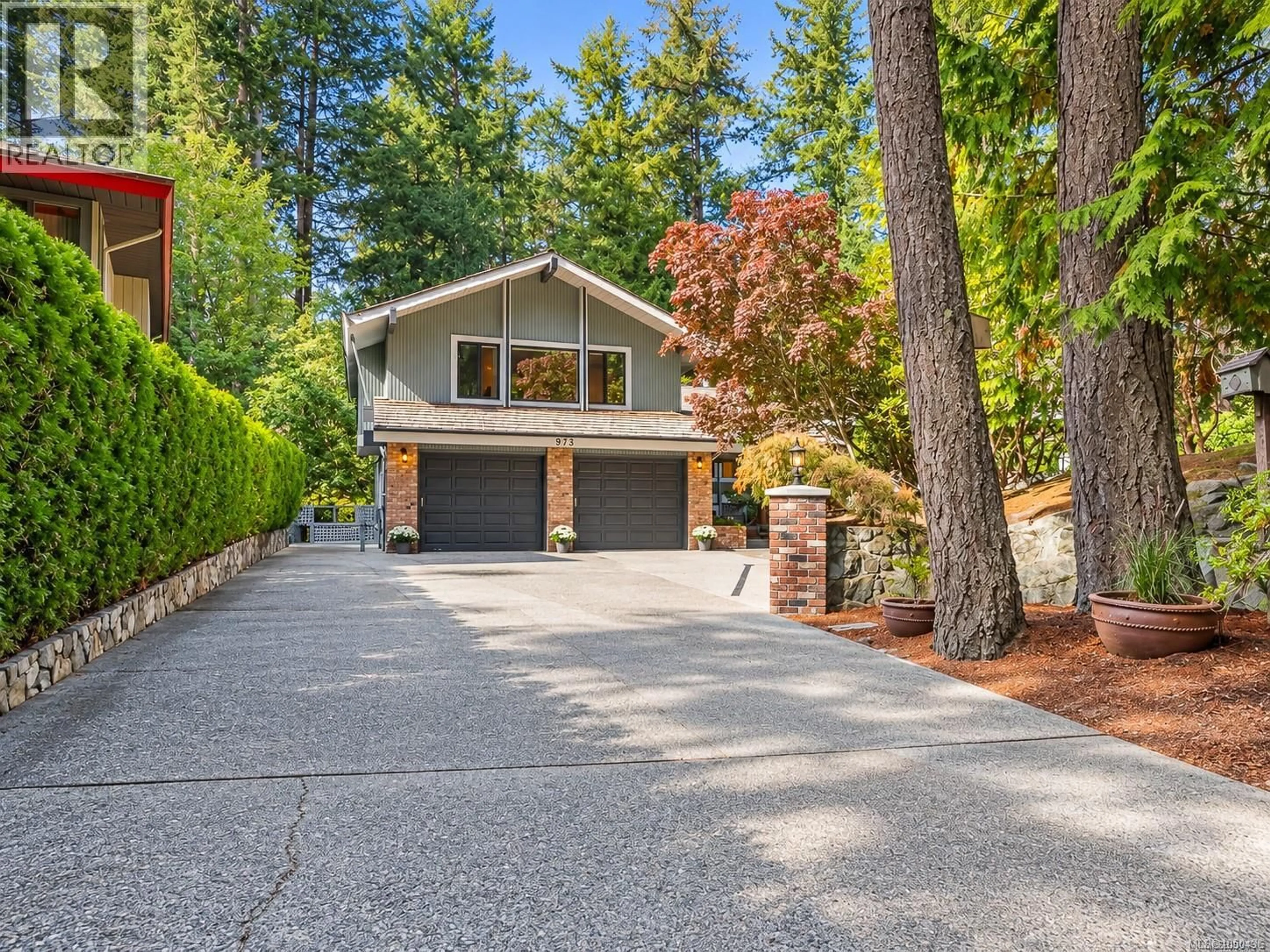 Home with vinyl exterior material, street for 973 WAGONWOOD PLACE, Saanich British Columbia V8X4M1