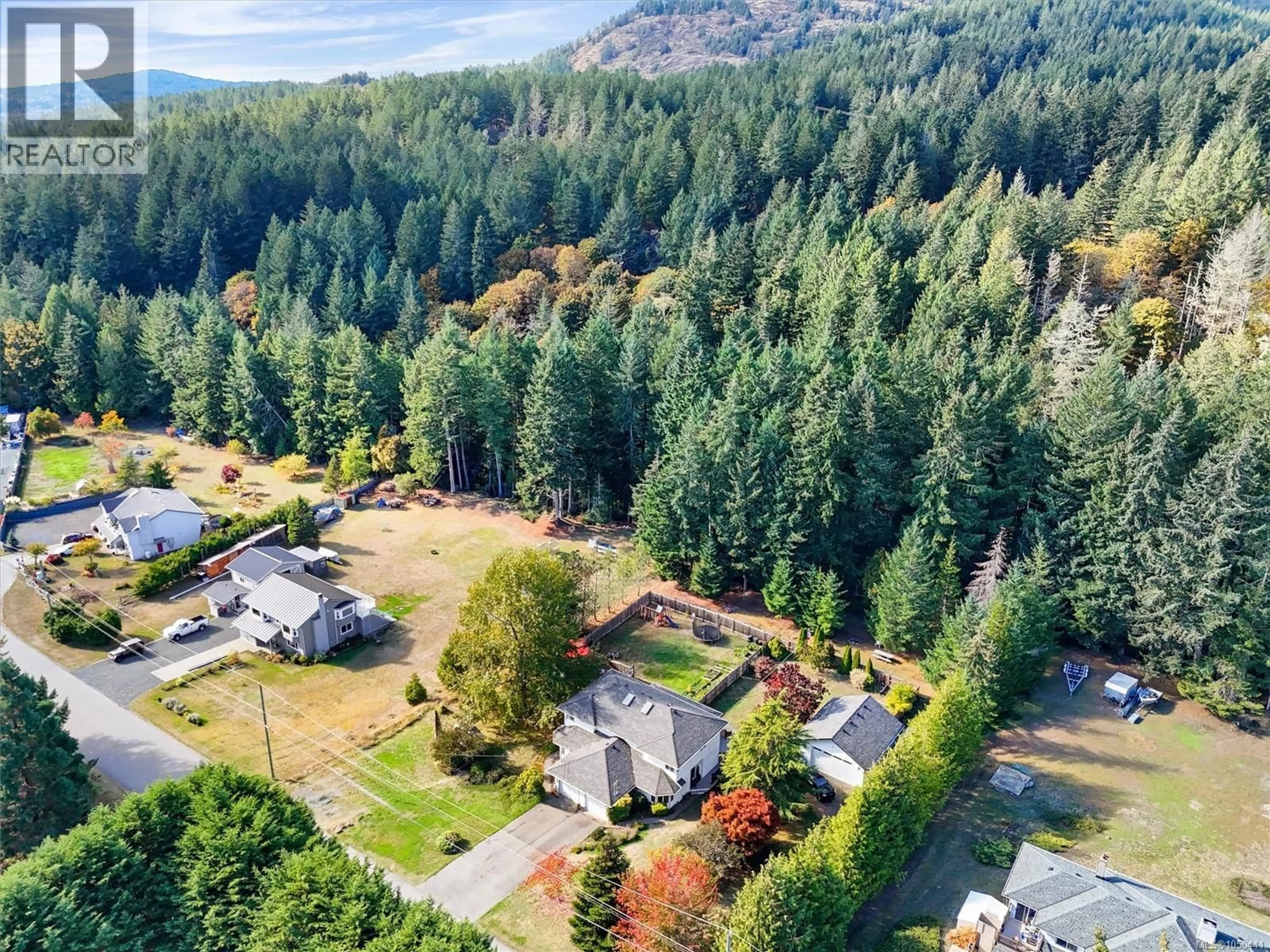 A pic from outside/outdoor area/front of a property/back of a property/a pic from drone, forest/trees view for 2209 AYUM ROAD, Sooke British Columbia V0S1N0