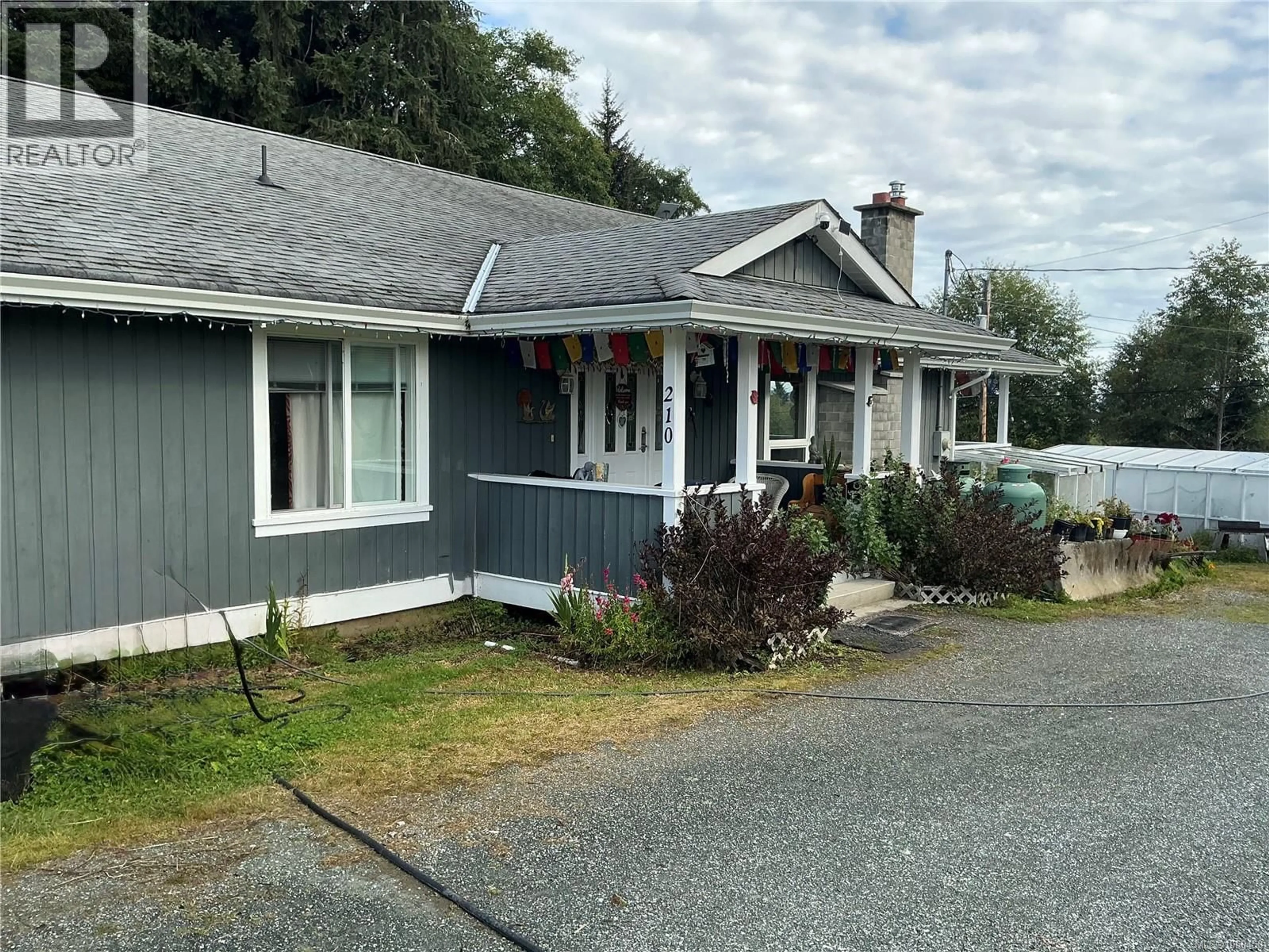 A pic from outside/outdoor area/front of a property/back of a property/a pic from drone, street for 210 POPLAR ROAD, Alert Bay British Columbia V0N1A0