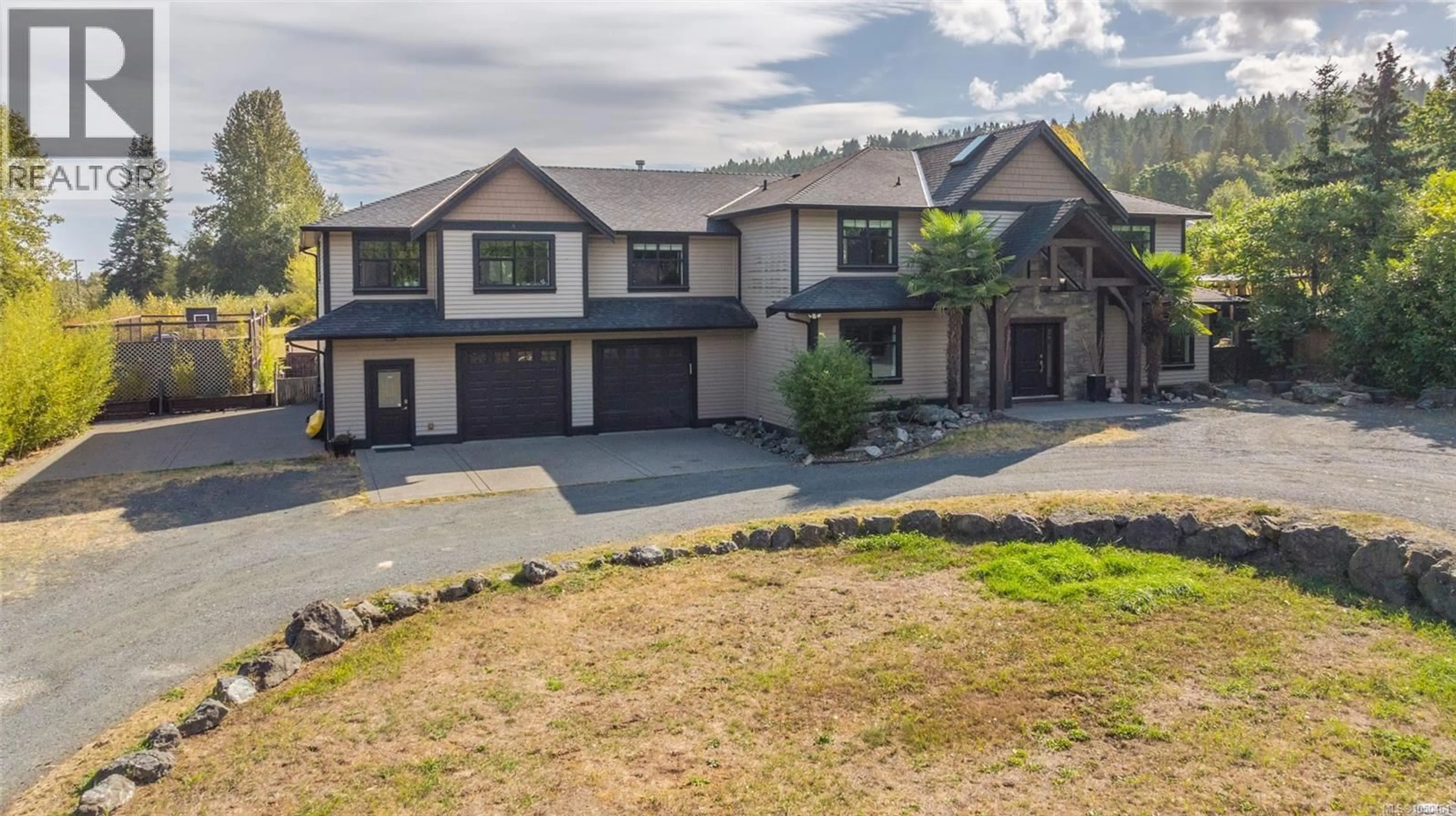 A pic from outside/outdoor area/front of a property/back of a property/a pic from drone, mountain view for 2466 SUMMERSET ROAD, Nanoose Bay British Columbia V9P9E4