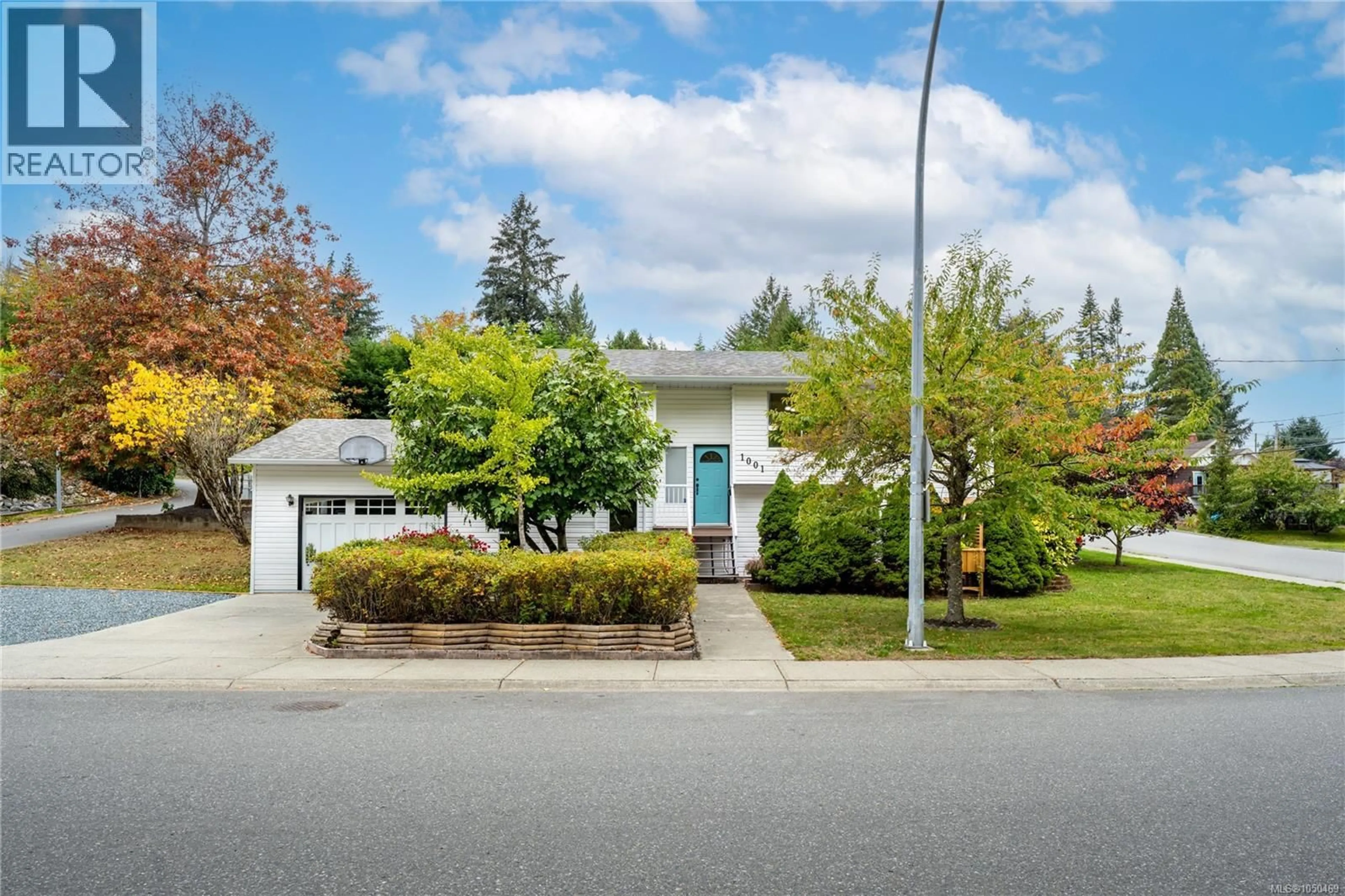 Home with vinyl exterior material, street for 1001 TIMBERWOOD DRIVE, Nanaimo British Columbia V9R6N9