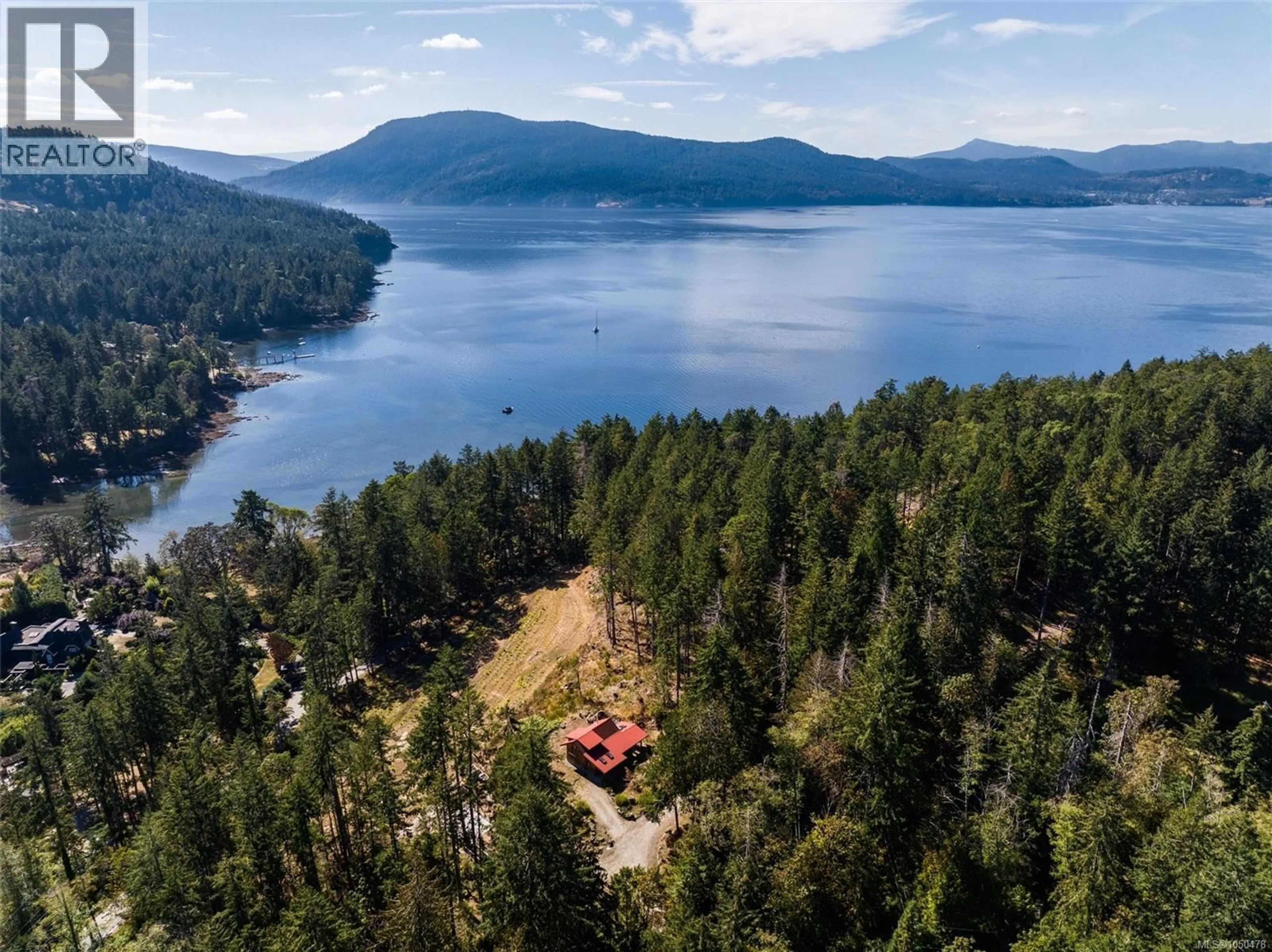 A pic from outside/outdoor area/front of a property/back of a property/a pic from drone, water/lake/river/ocean view for 370/400 BAKER ROAD, Salt Spring British Columbia V8K2N5