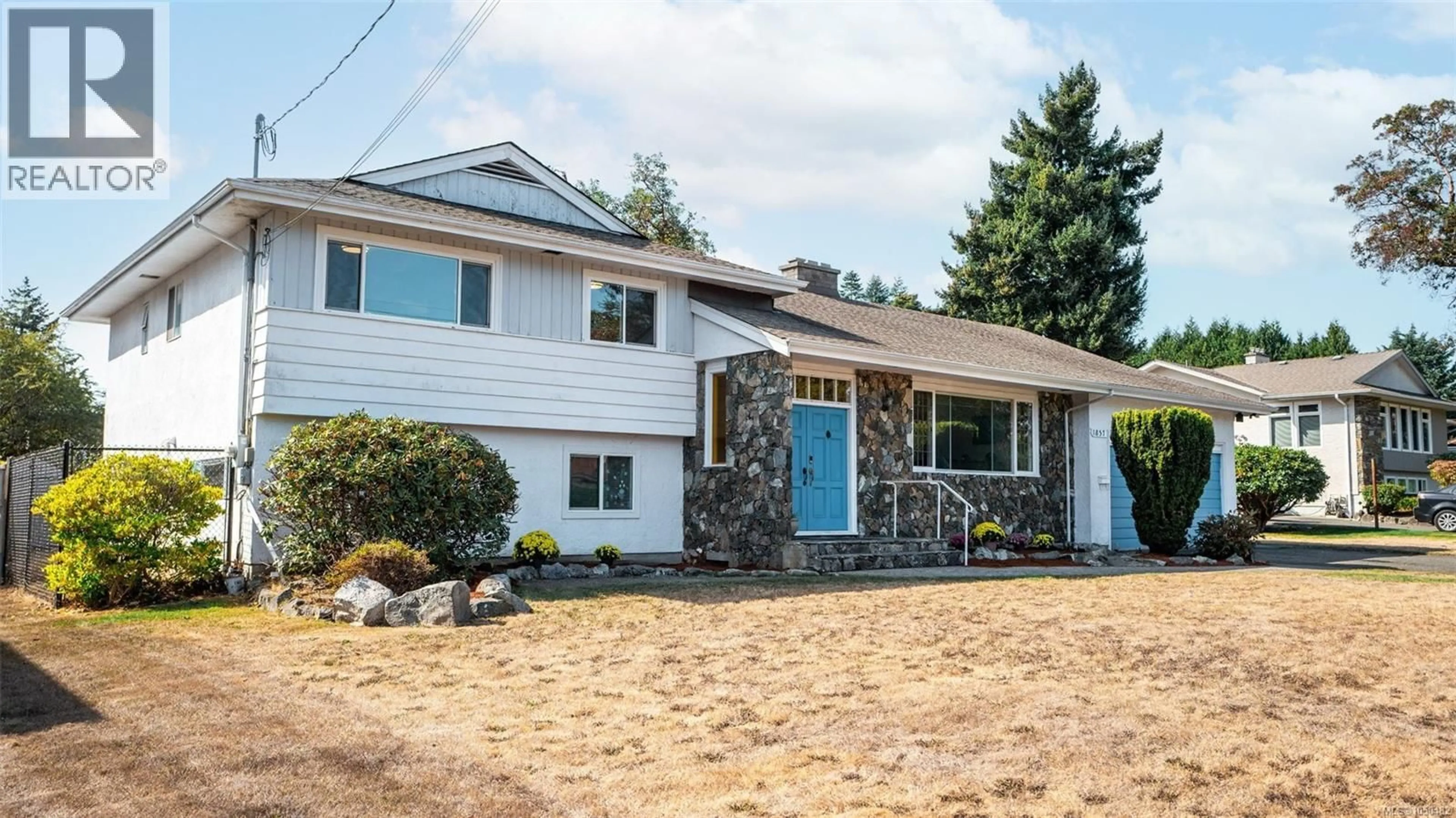 Home with vinyl exterior material, street for 1857 HILLCREST AVENUE, Saanich British Columbia V8N2R7