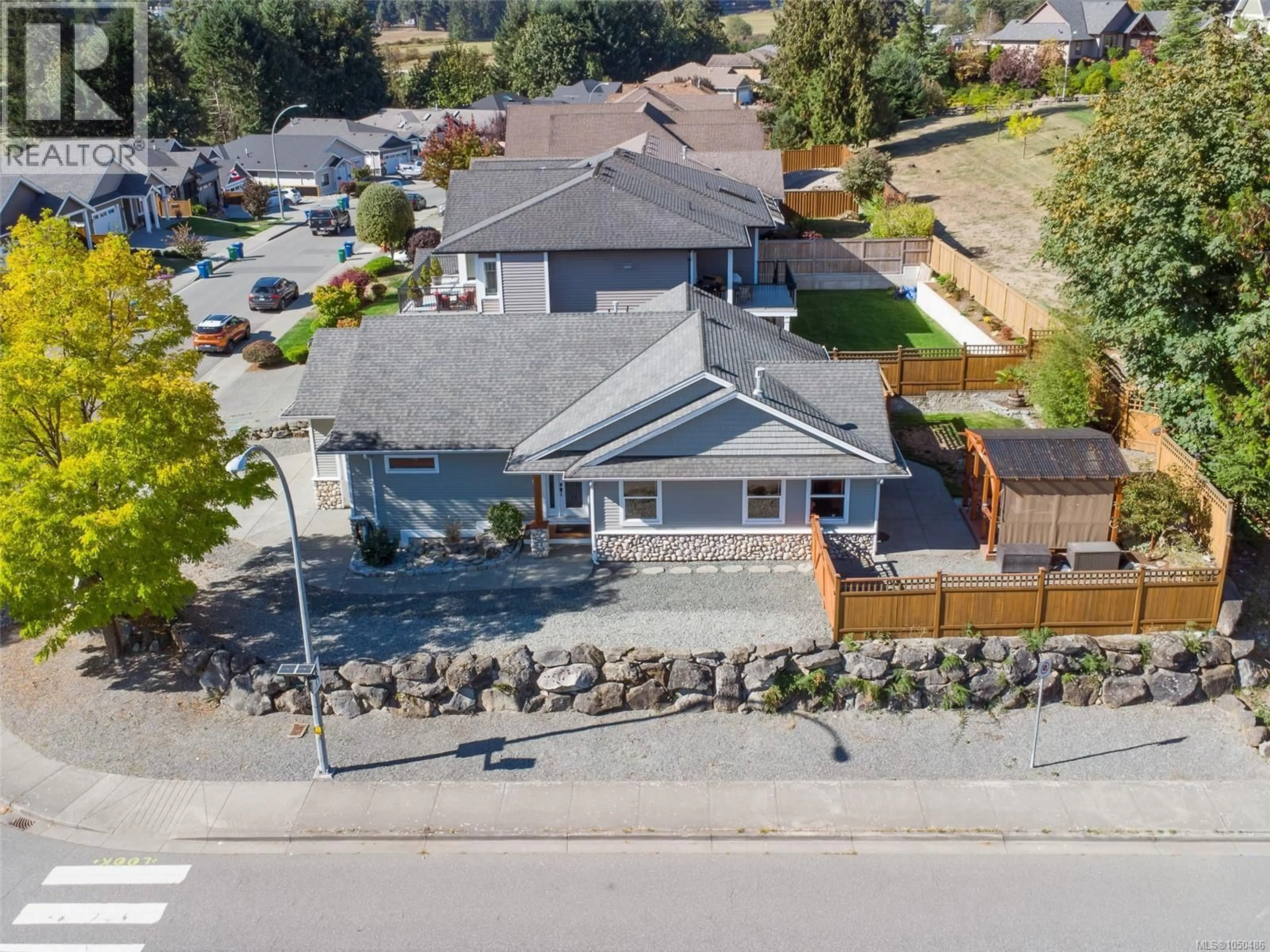 A pic from outside/outdoor area/front of a property/back of a property/a pic from drone, street for 3490 MONTEREY DRIVE, Nanaimo British Columbia V9T6T2