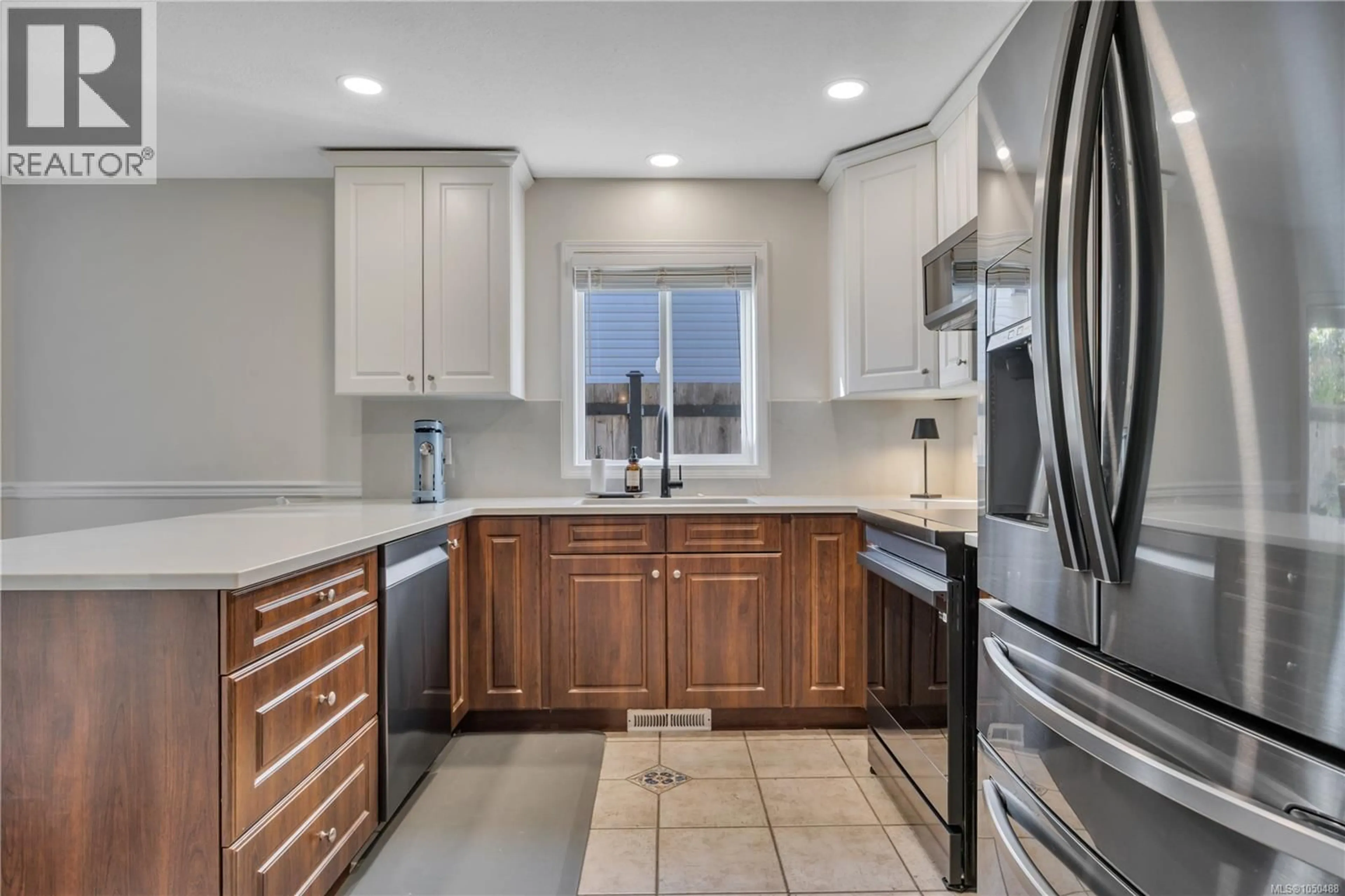 Open concept kitchen, ceramic/tile floor for 5911 WALDBANK ROAD, Nanaimo British Columbia V9V1P1