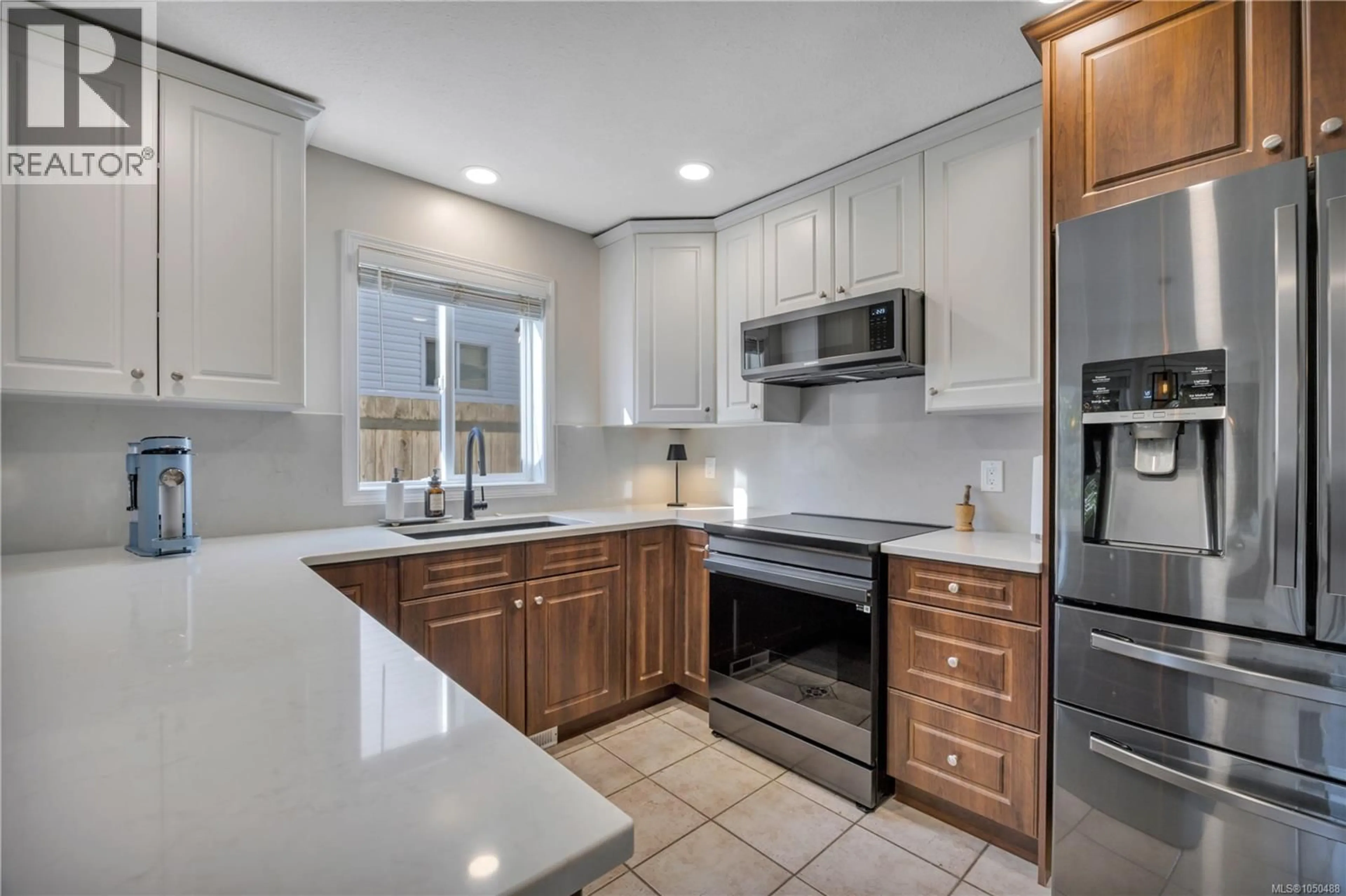 Open concept kitchen, ceramic/tile floor for 5911 WALDBANK ROAD, Nanaimo British Columbia V9V1P1