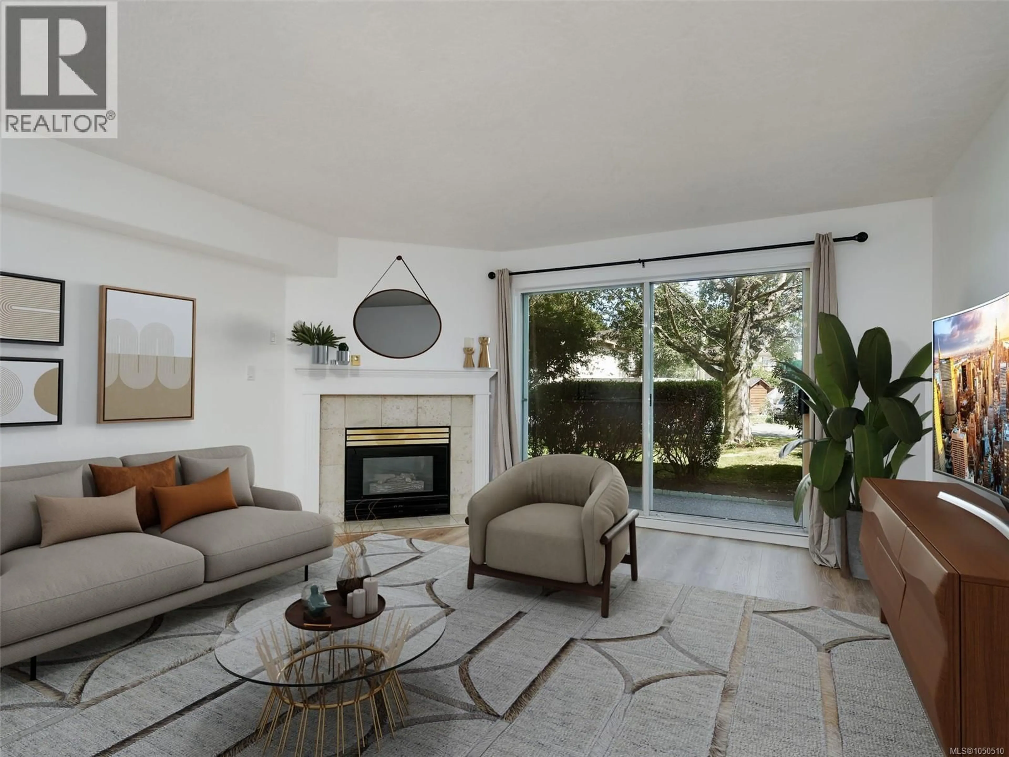 Living room with furniture, unknown for 101 - 3724 HARRIET ROAD, Saanich British Columbia V8Z3T2
