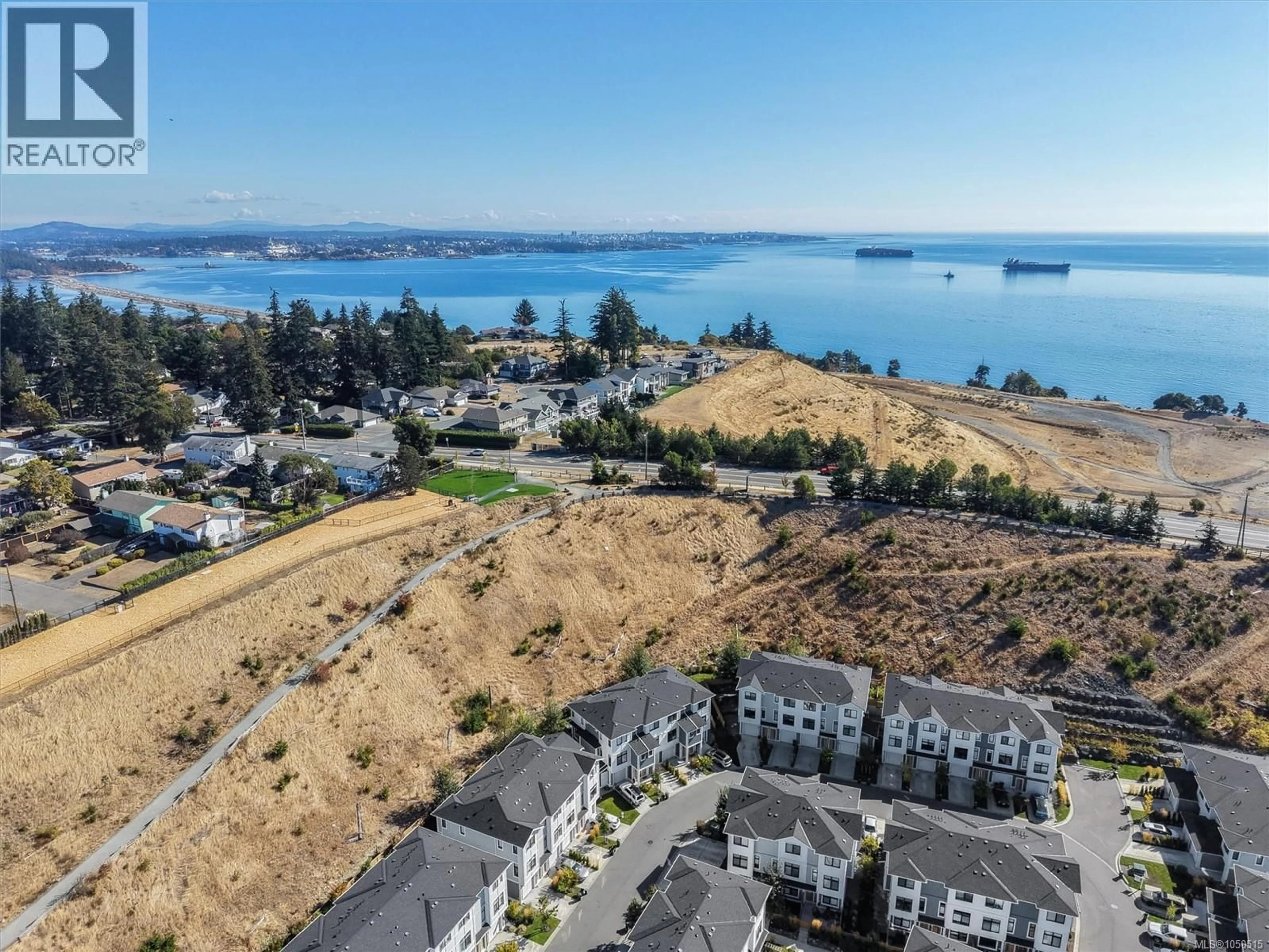 A pic from outside/outdoor area/front of a property/back of a property/a pic from drone, water/lake/river/ocean view for 38 - 255 CASPIAN DRIVE, Colwood British Columbia V9C0R9