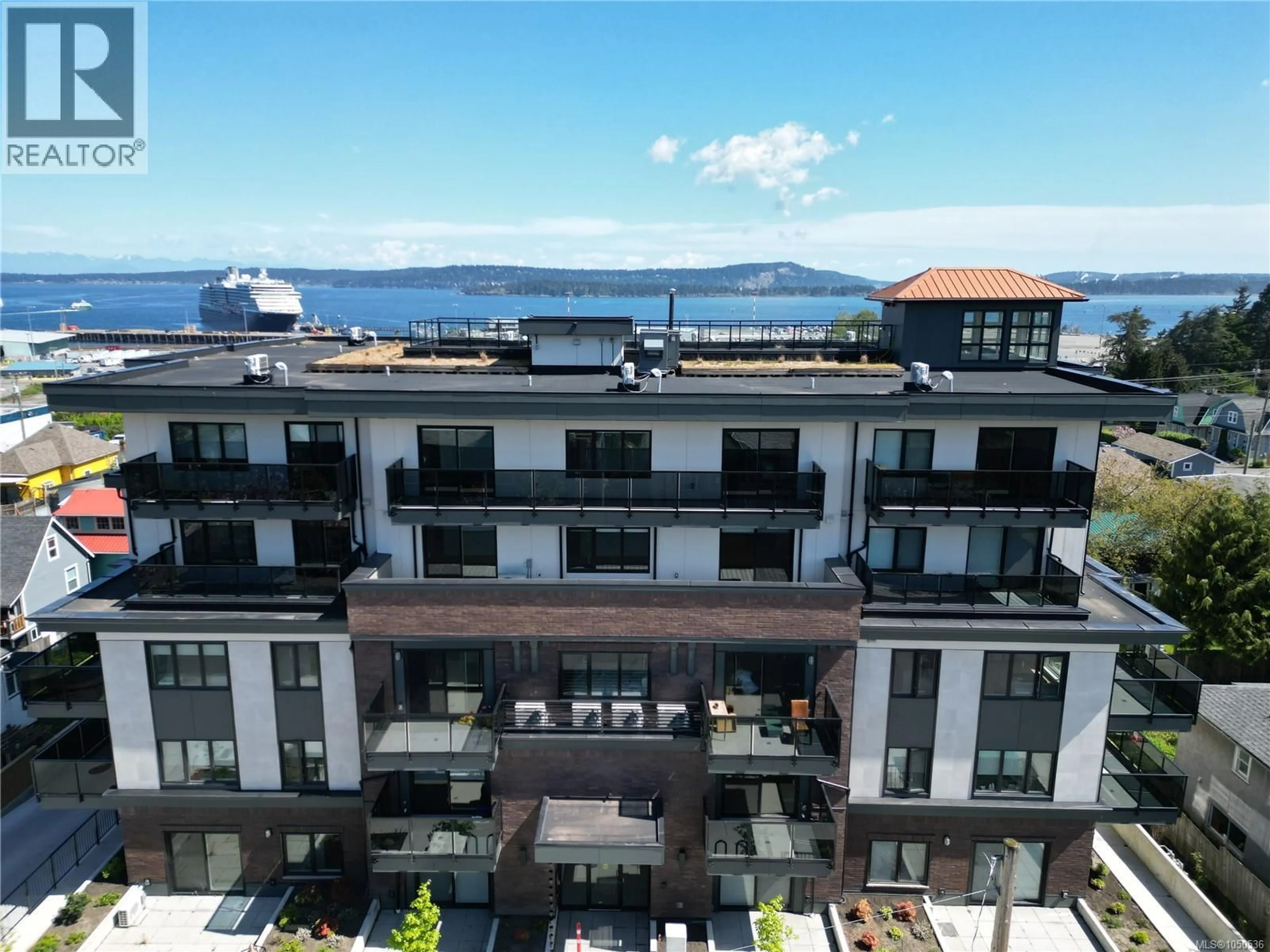 A pic from outside/outdoor area/front of a property/back of a property/a pic from drone, unknown for 304 - 45 HALIBURTON STREET, Nanaimo British Columbia V9R4V6