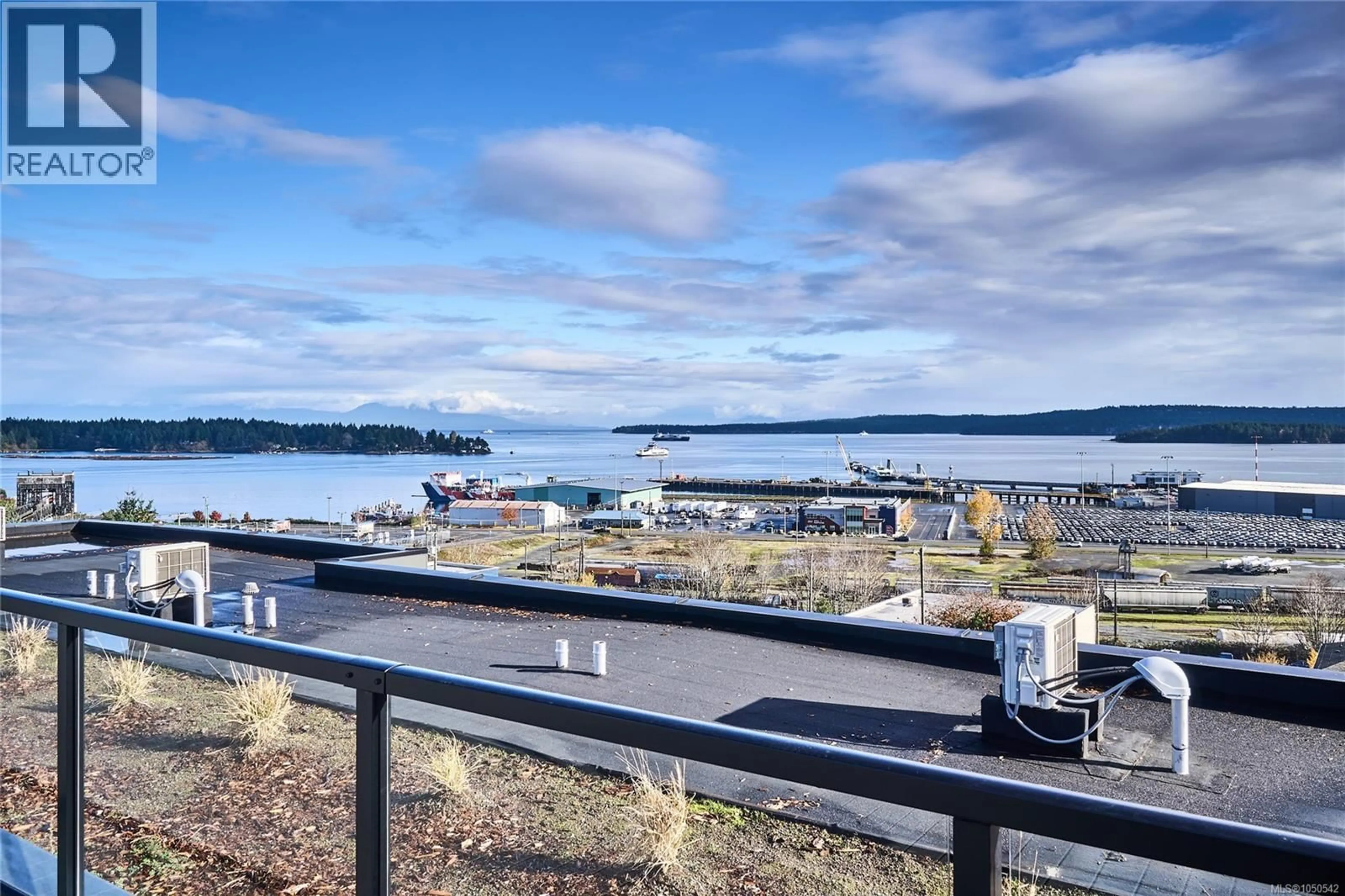 A pic from outside/outdoor area/front of a property/back of a property/a pic from drone, water/lake/river/ocean view for 407 - 45 HALIBURTON STREET, Nanaimo British Columbia V9R4V6