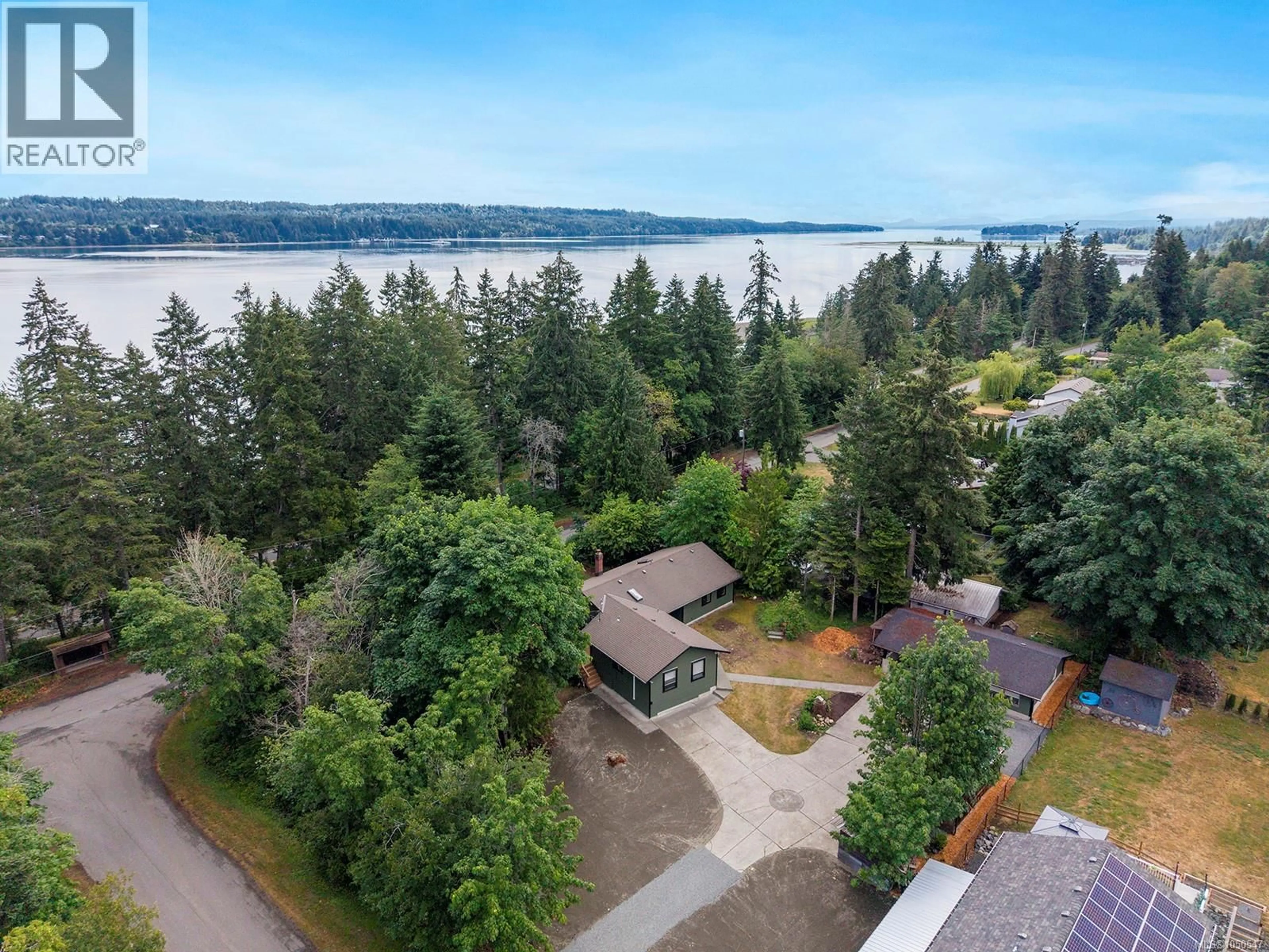 A pic from outside/outdoor area/front of a property/back of a property/a pic from drone, water/lake/river/ocean view for 6585 WALKER FRONTAGE ROAD, Fanny Bay British Columbia V0R1W0
