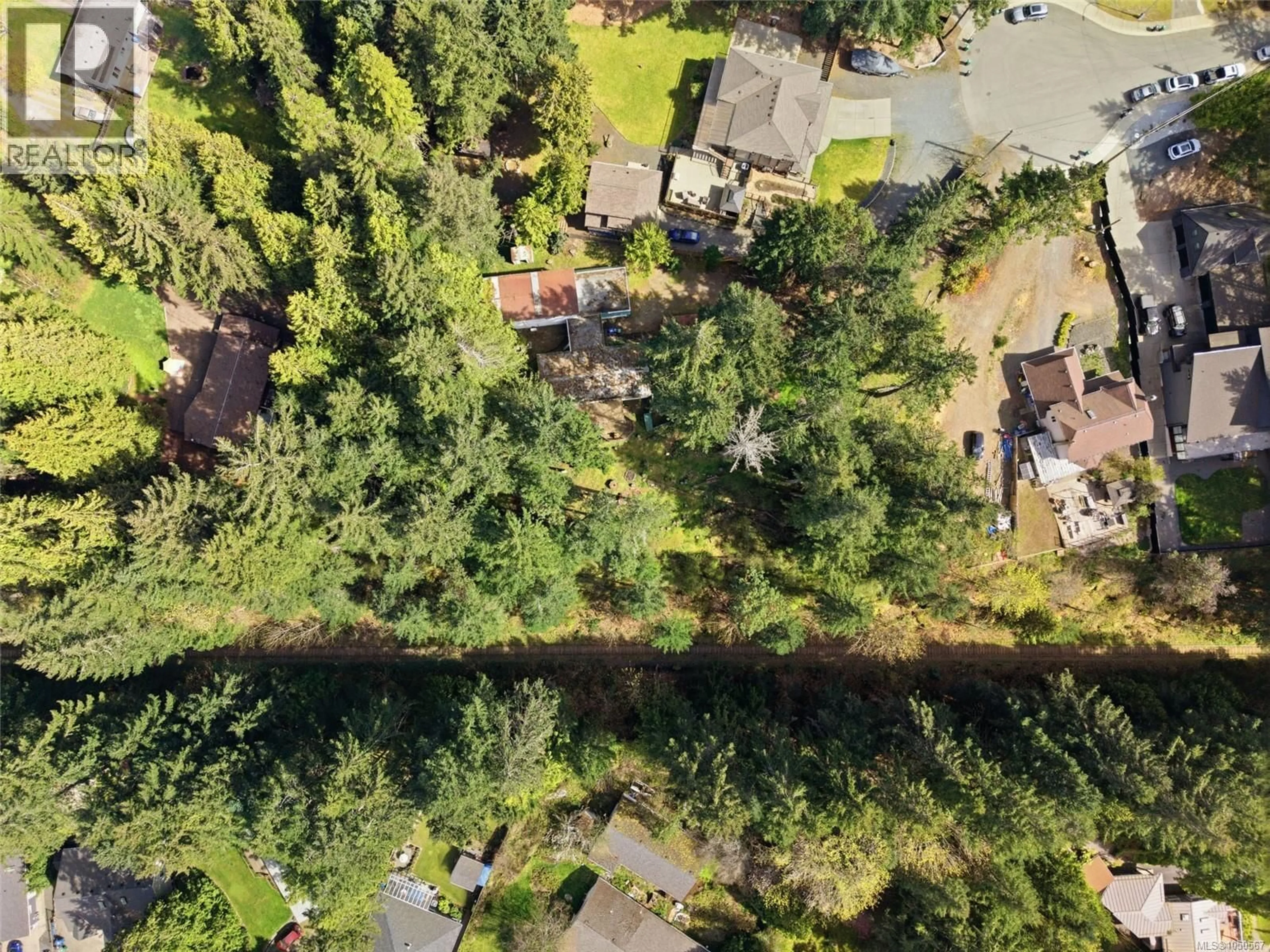 A pic from outside/outdoor area/front of a property/back of a property/a pic from drone, forest/trees view for 69 LAKE PLACE, Nanaimo British Columbia V9T5S1
