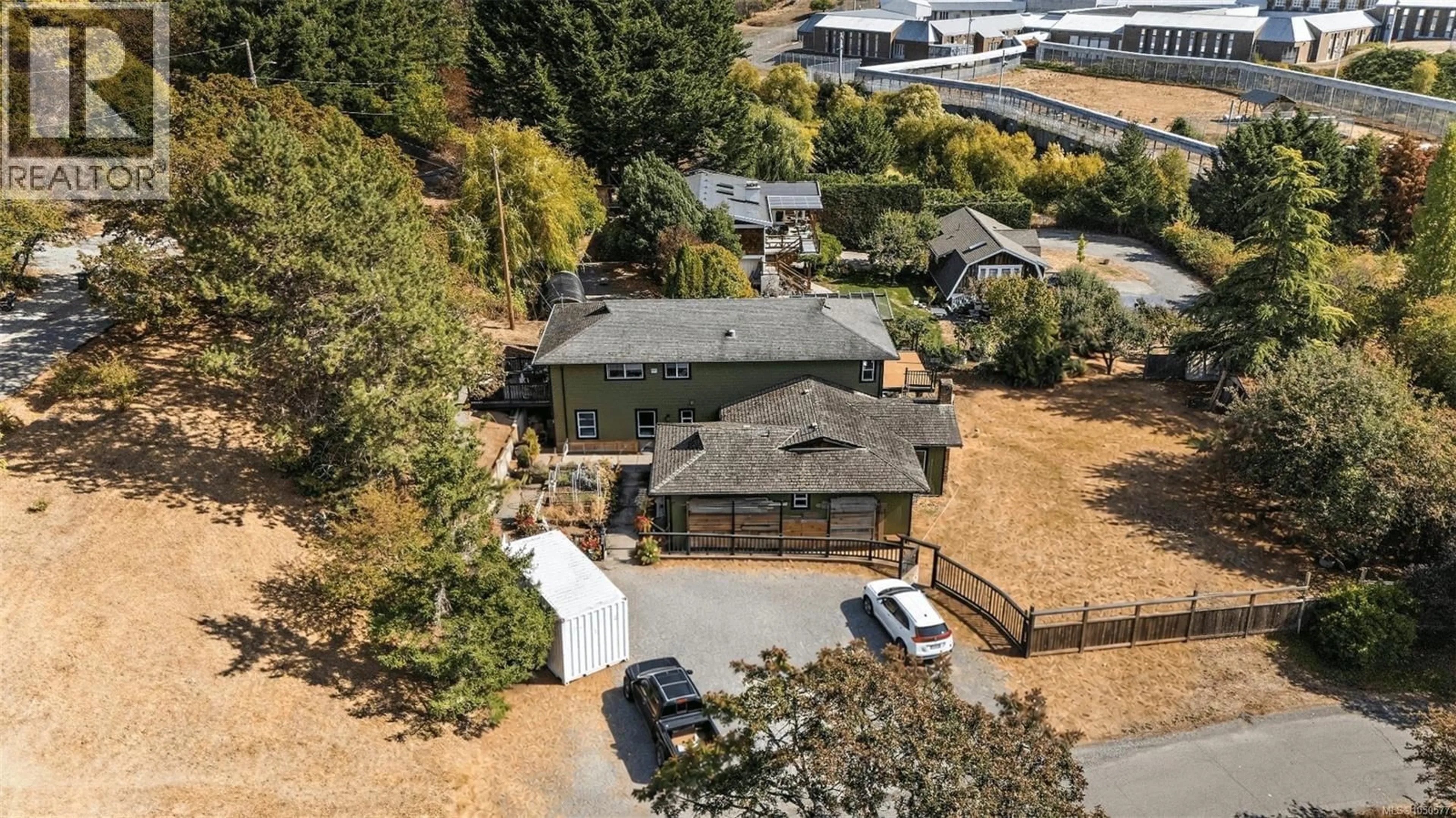A pic from outside/outdoor area/front of a property/back of a property/a pic from drone, mountain view for 1321 PRILLAMAN AVENUE, Saanich British Columbia V9E2C6