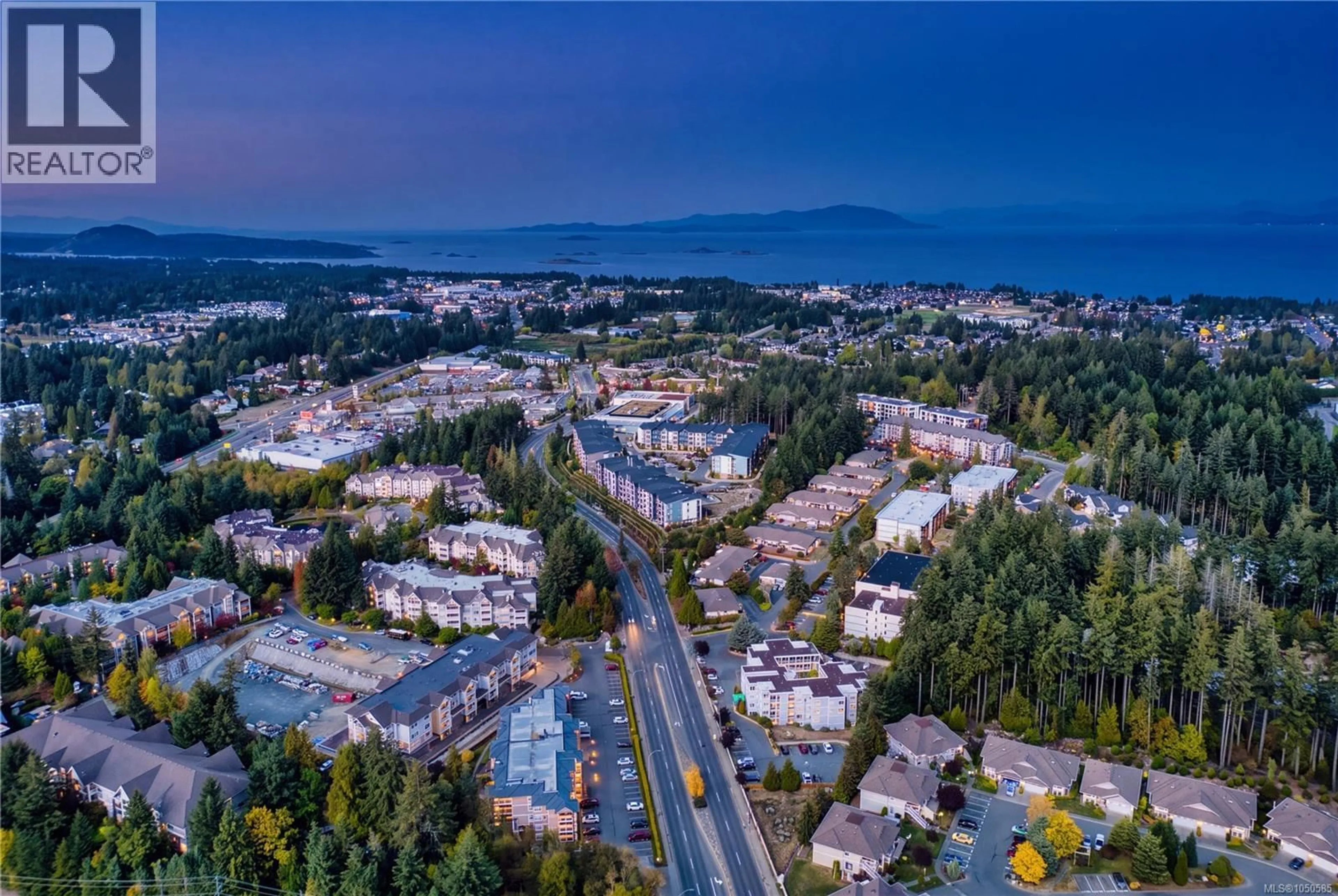 A pic from outside/outdoor area/front of a property/back of a property/a pic from drone, mountain view for 405 - 4720 UPLANDS DRIVE, Nanaimo British Columbia V9T4S7