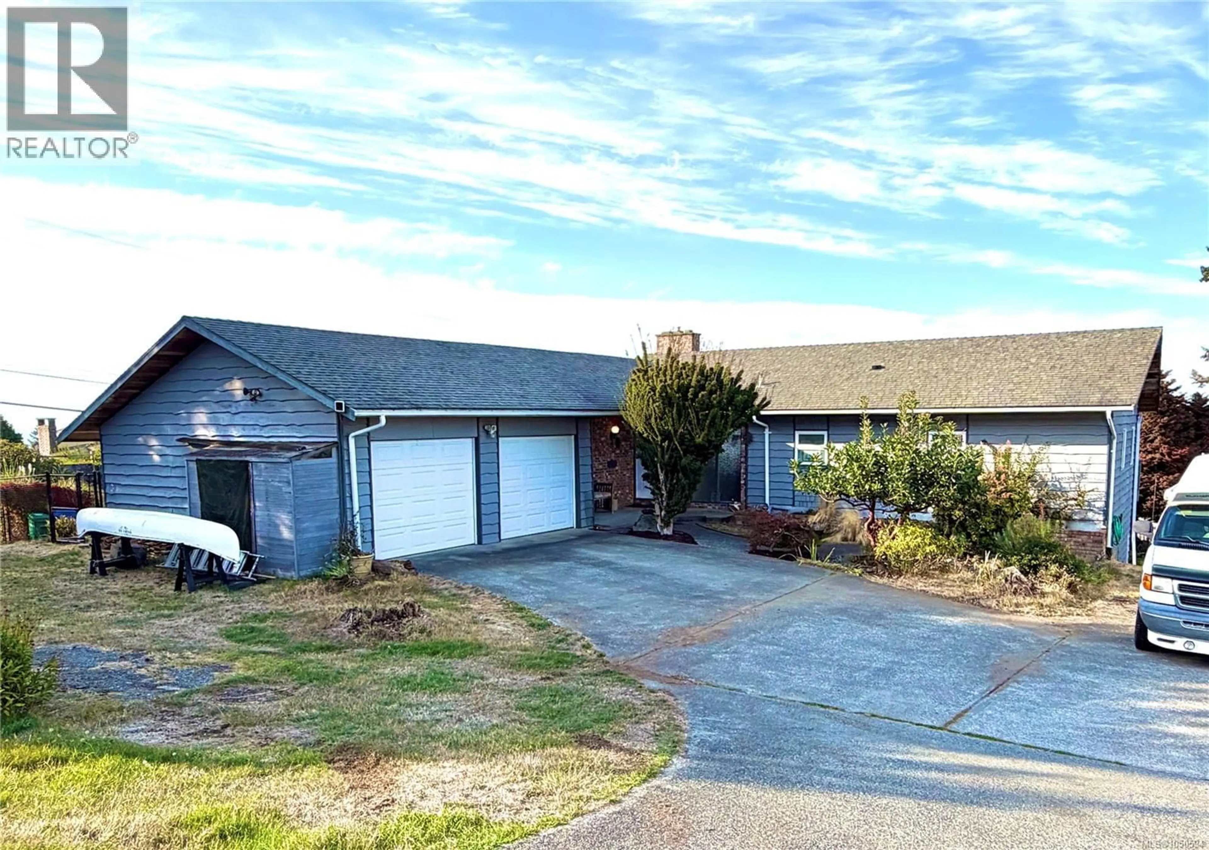 A pic from outside/outdoor area/front of a property/back of a property/a pic from drone, street for 5400 ENTWHISTLE DRIVE, Nanaimo British Columbia V9V1H2