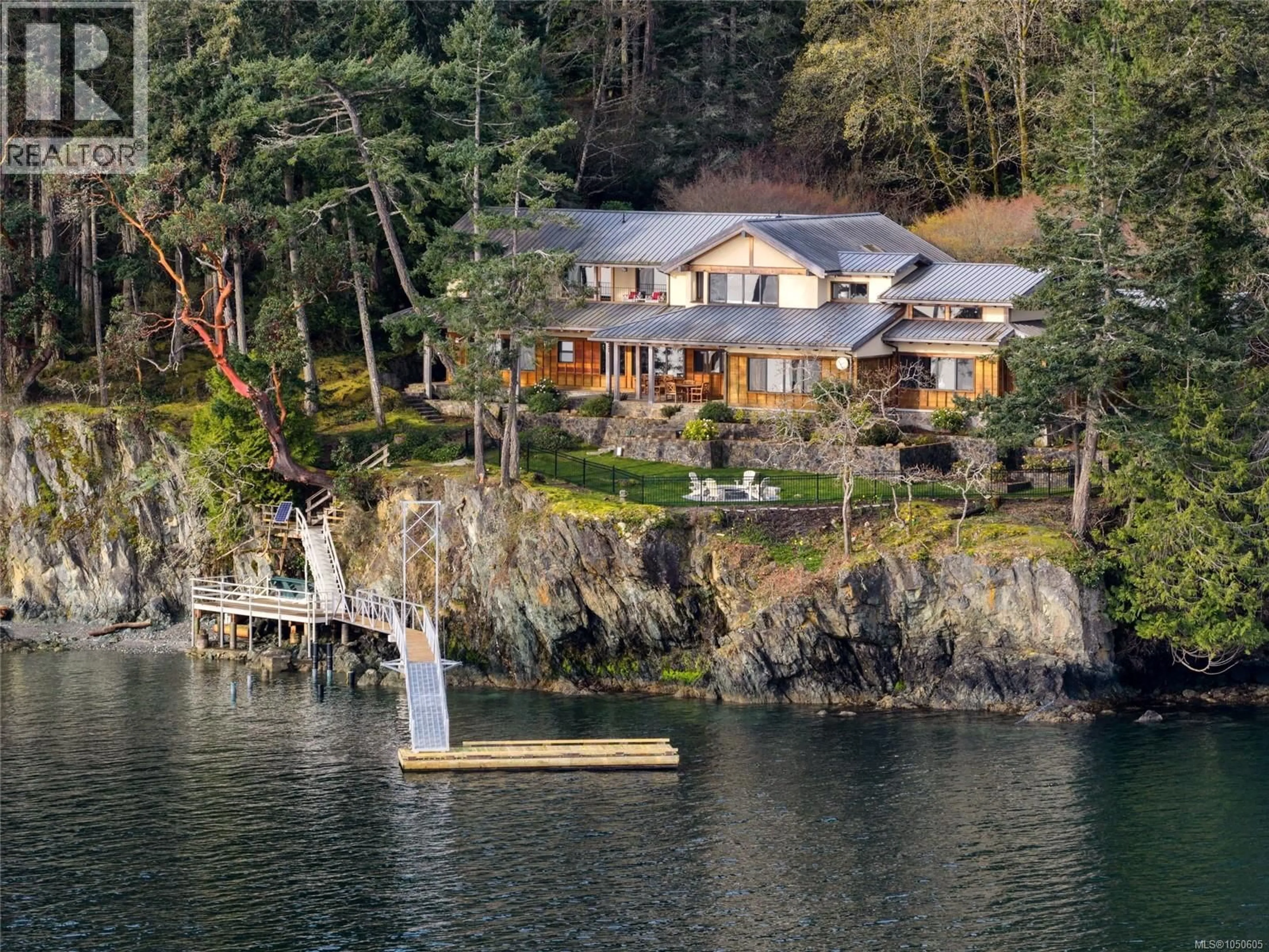 A pic from outside/outdoor area/front of a property/back of a property/a pic from drone, water/lake/river/ocean view for 250 HOLMES ROAD, Salt Spring British Columbia V8K1T6