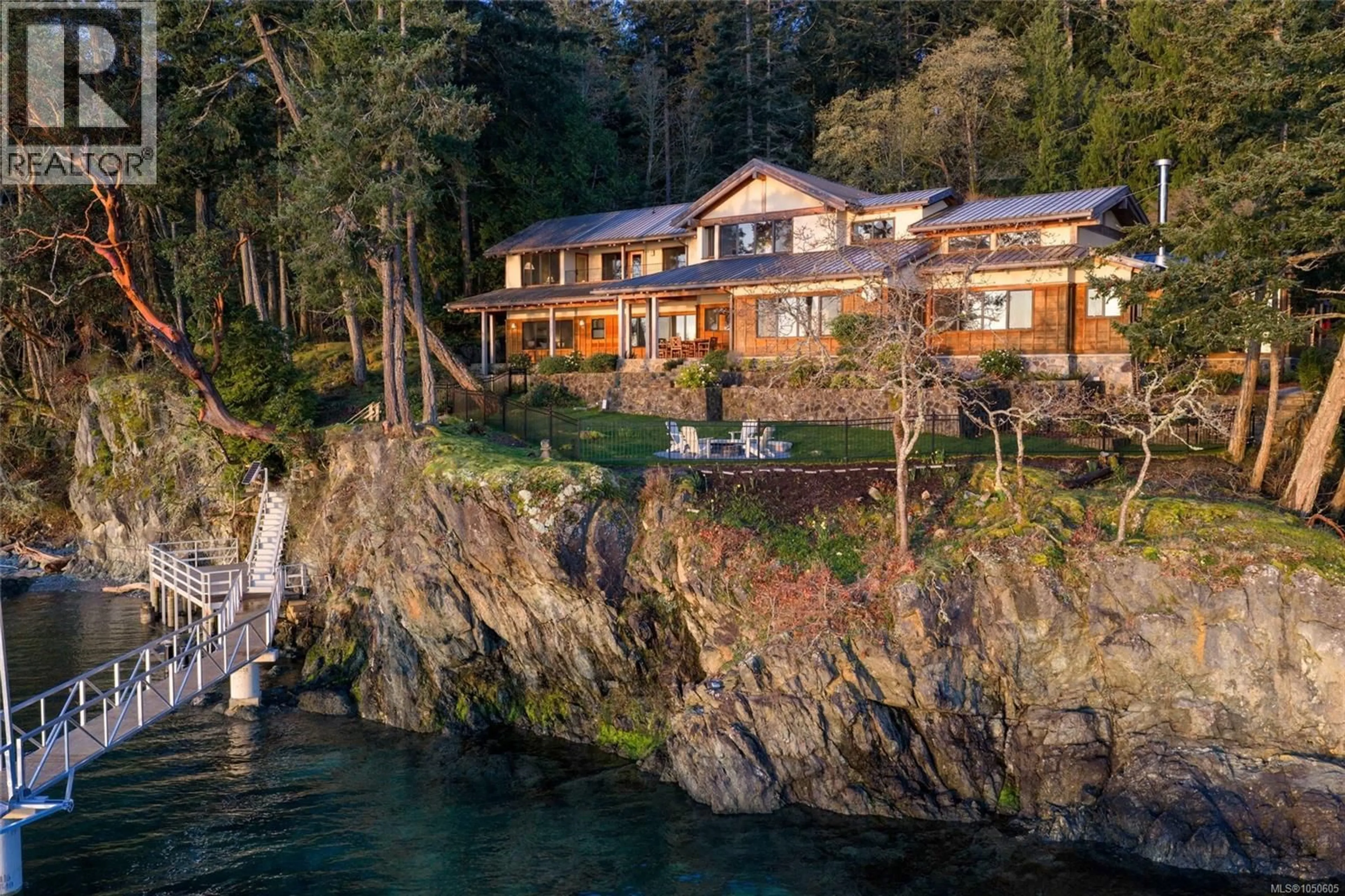 A pic from outside/outdoor area/front of a property/back of a property/a pic from drone, water/lake/river/ocean view for 250 HOLMES ROAD, Salt Spring British Columbia V8K1T6