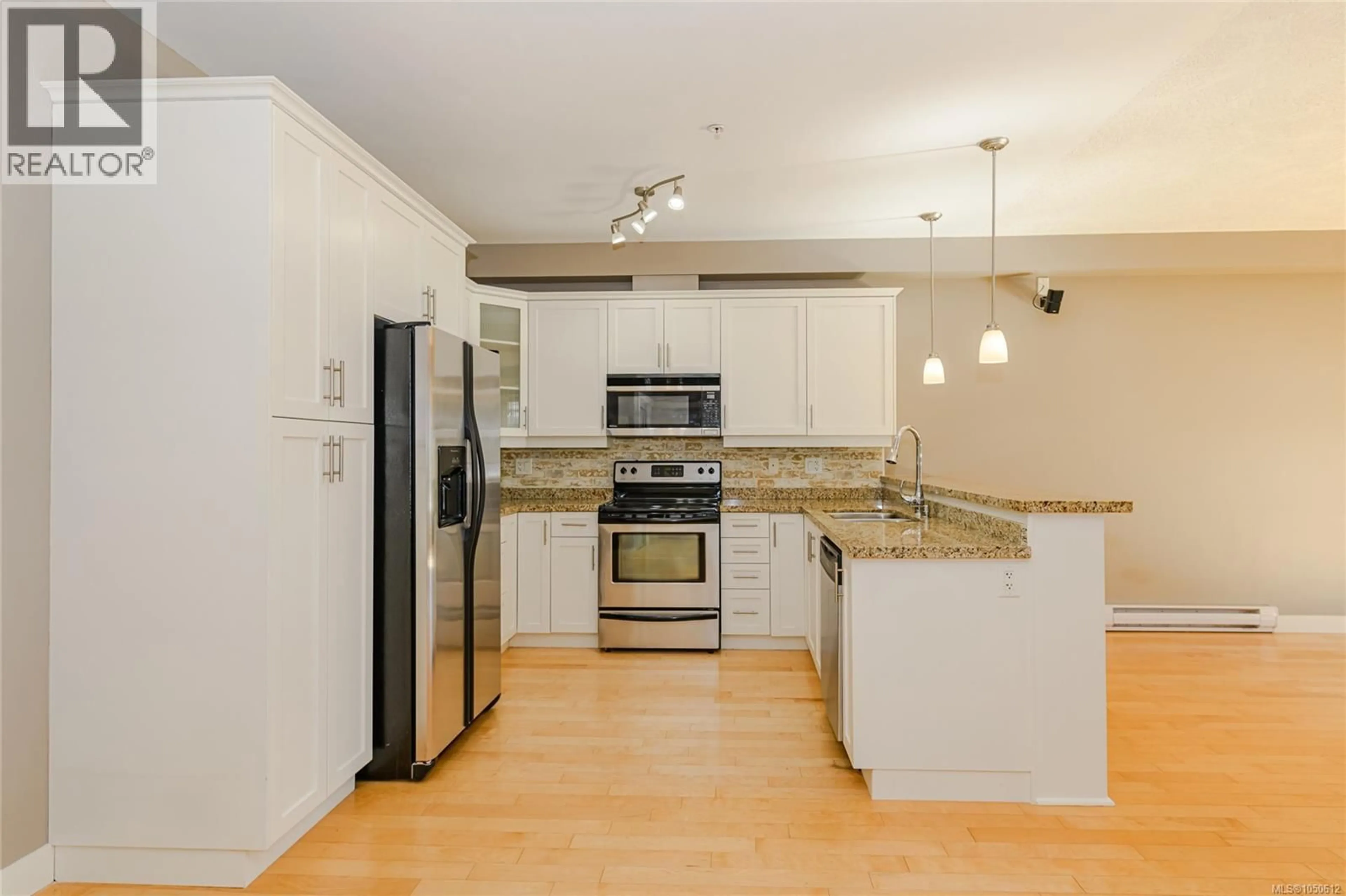 Open concept kitchen, unknown for 317 - 2710 JACKLIN ROAD, Langford British Columbia V9B2X4