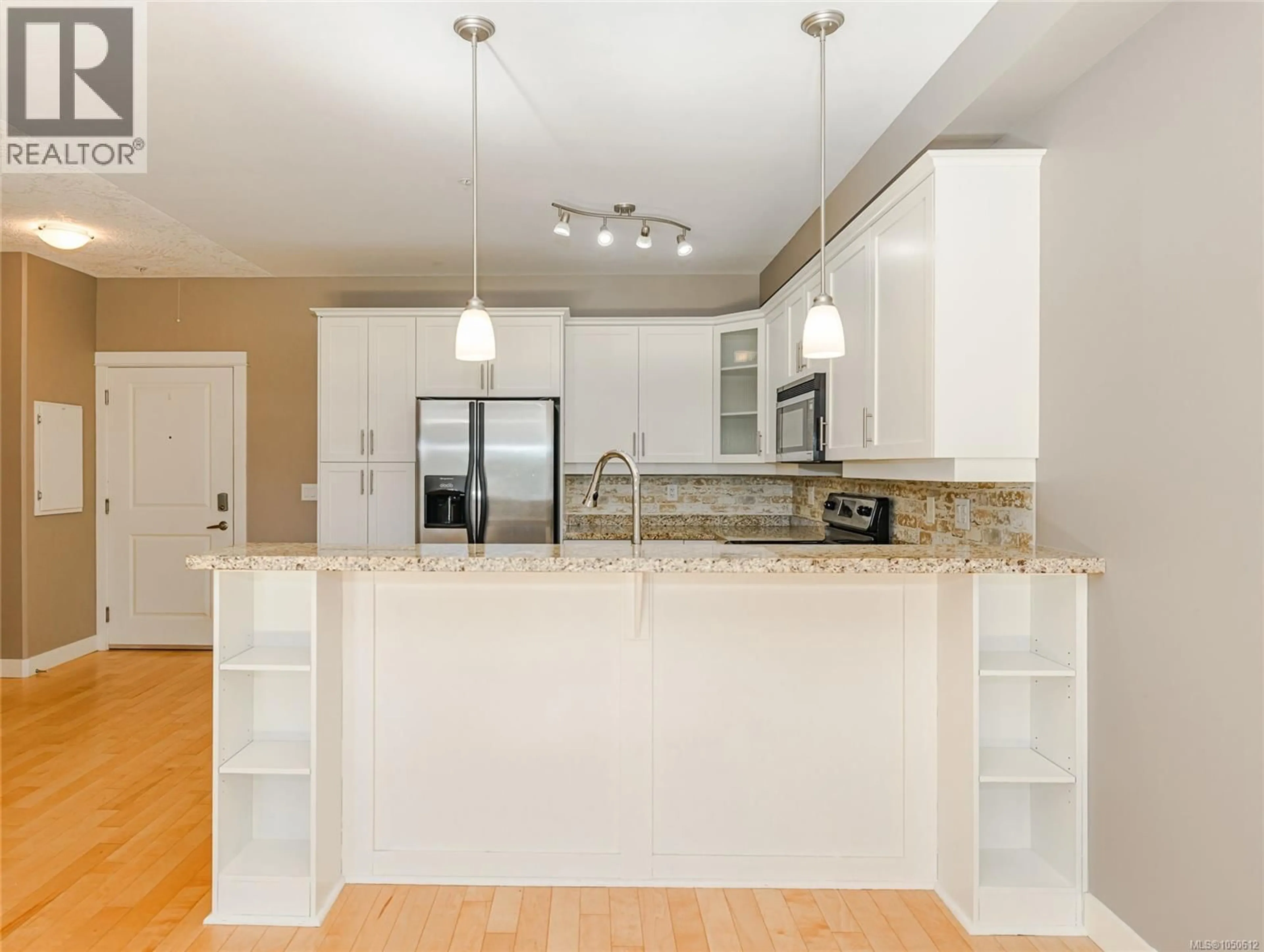 Open concept kitchen, unknown for 317 - 2710 JACKLIN ROAD, Langford British Columbia V9B2X4