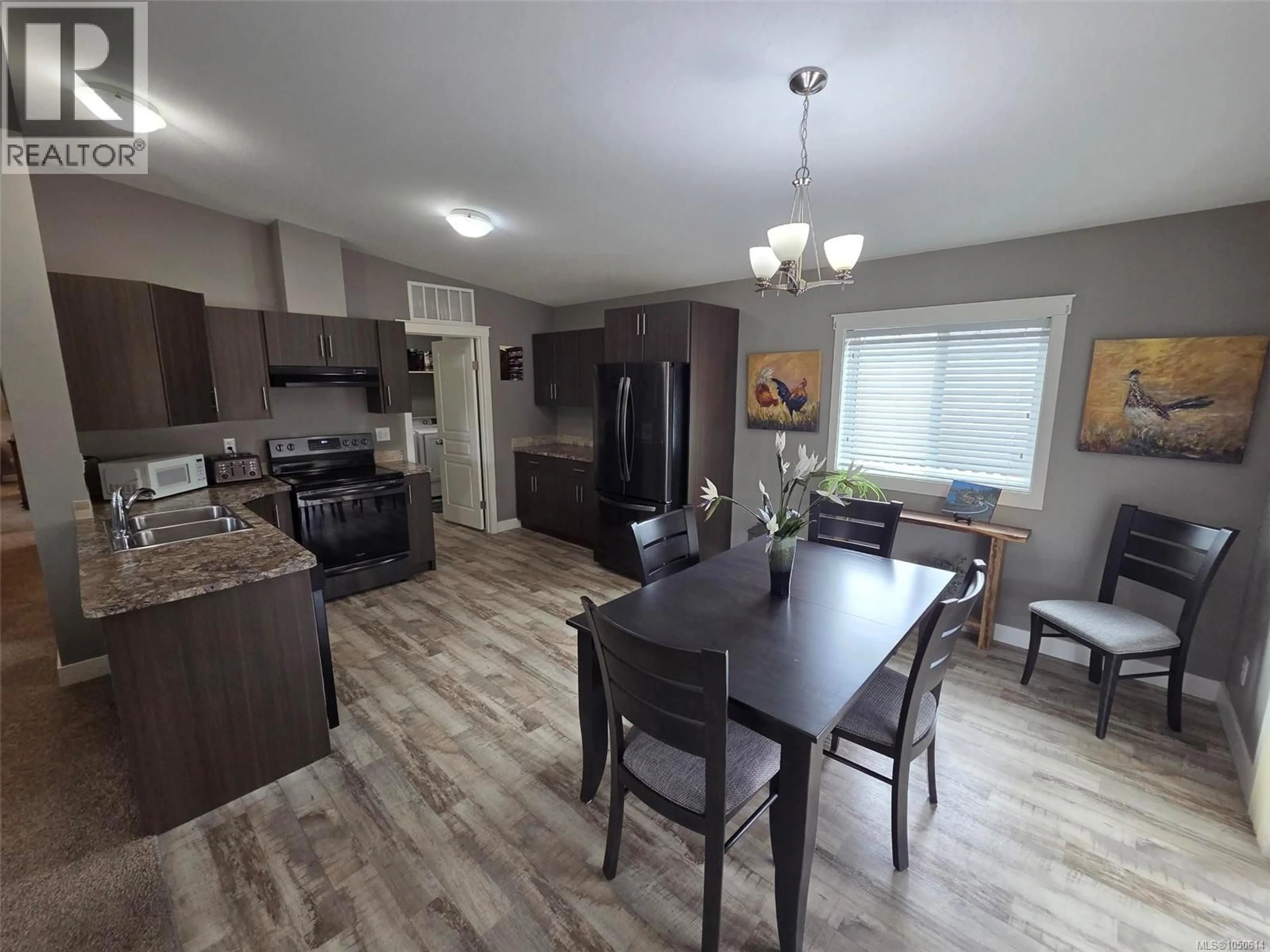 Open concept kitchen, wood/laminate floor for 116 - 5555 GRANDVIEW ROAD, Port Alberni British Columbia V9Y8H5