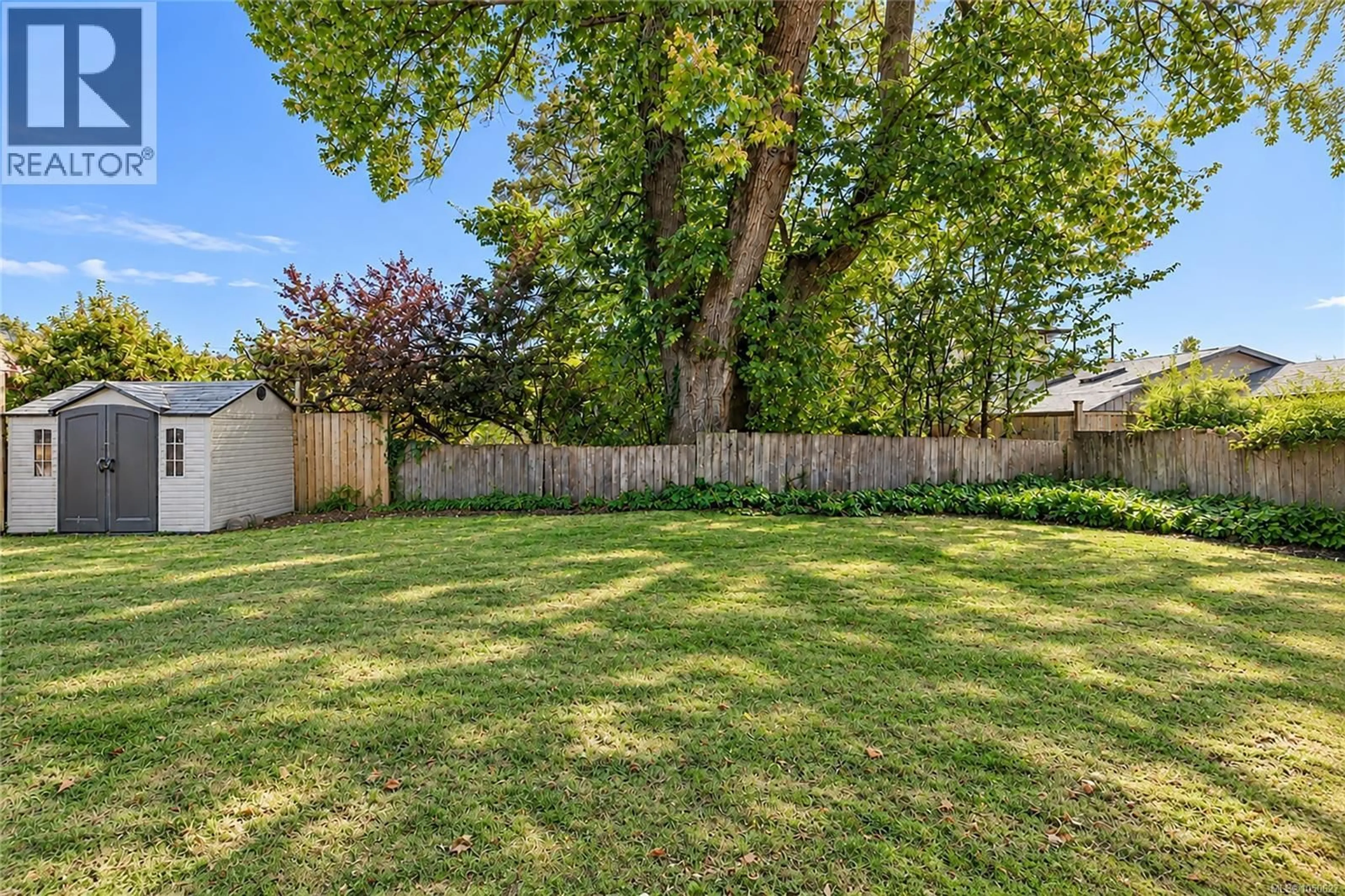 A pic from outside/outdoor area/front of a property/back of a property/a pic from drone, street for 1711 CHRISTMAS AVENUE, Saanich British Columbia V8P2X9