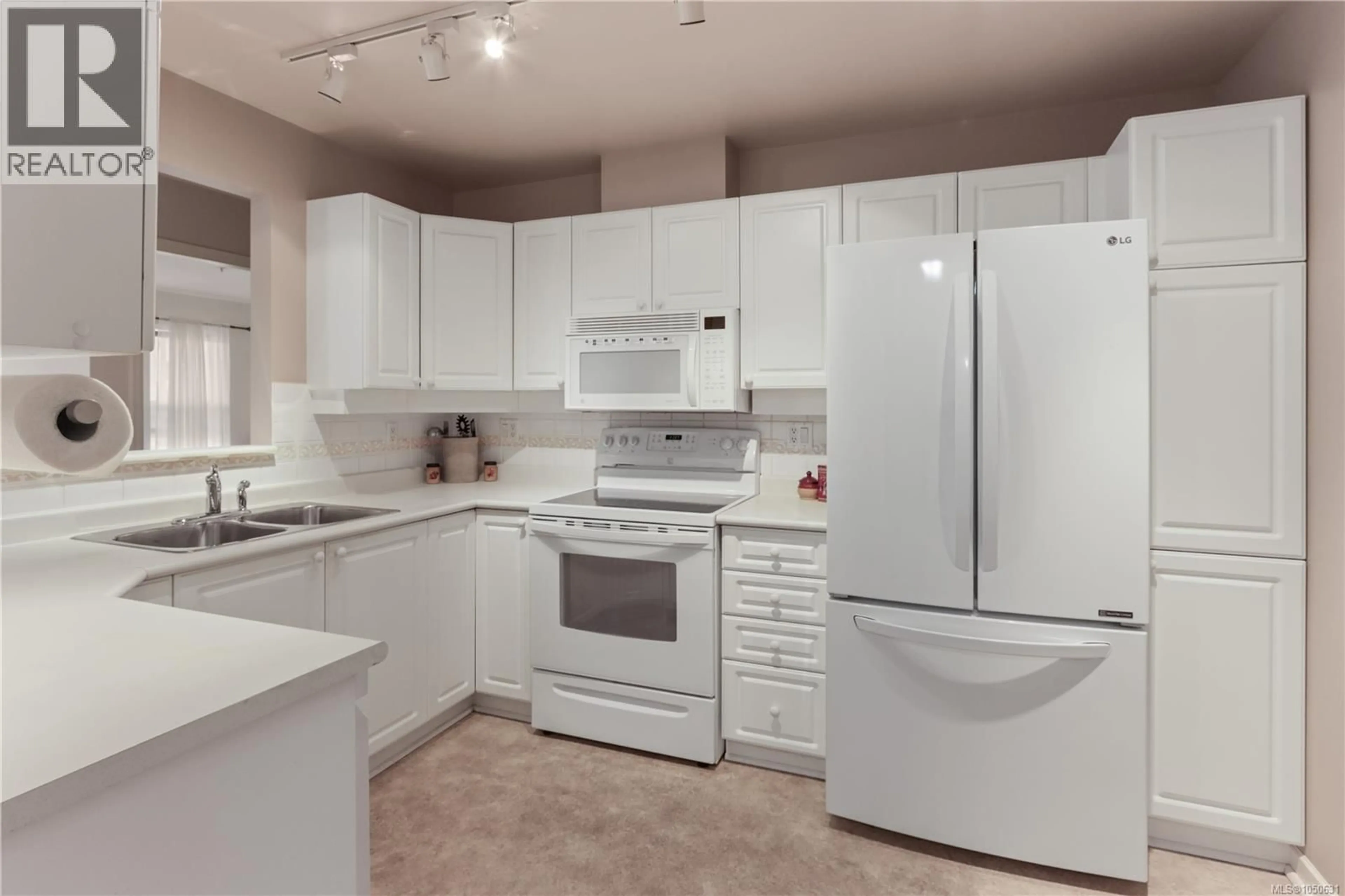 Standard kitchen, ceramic/tile floor for 402 - 5620 EDGEWATER LANE, Nanaimo British Columbia V9T6K1
