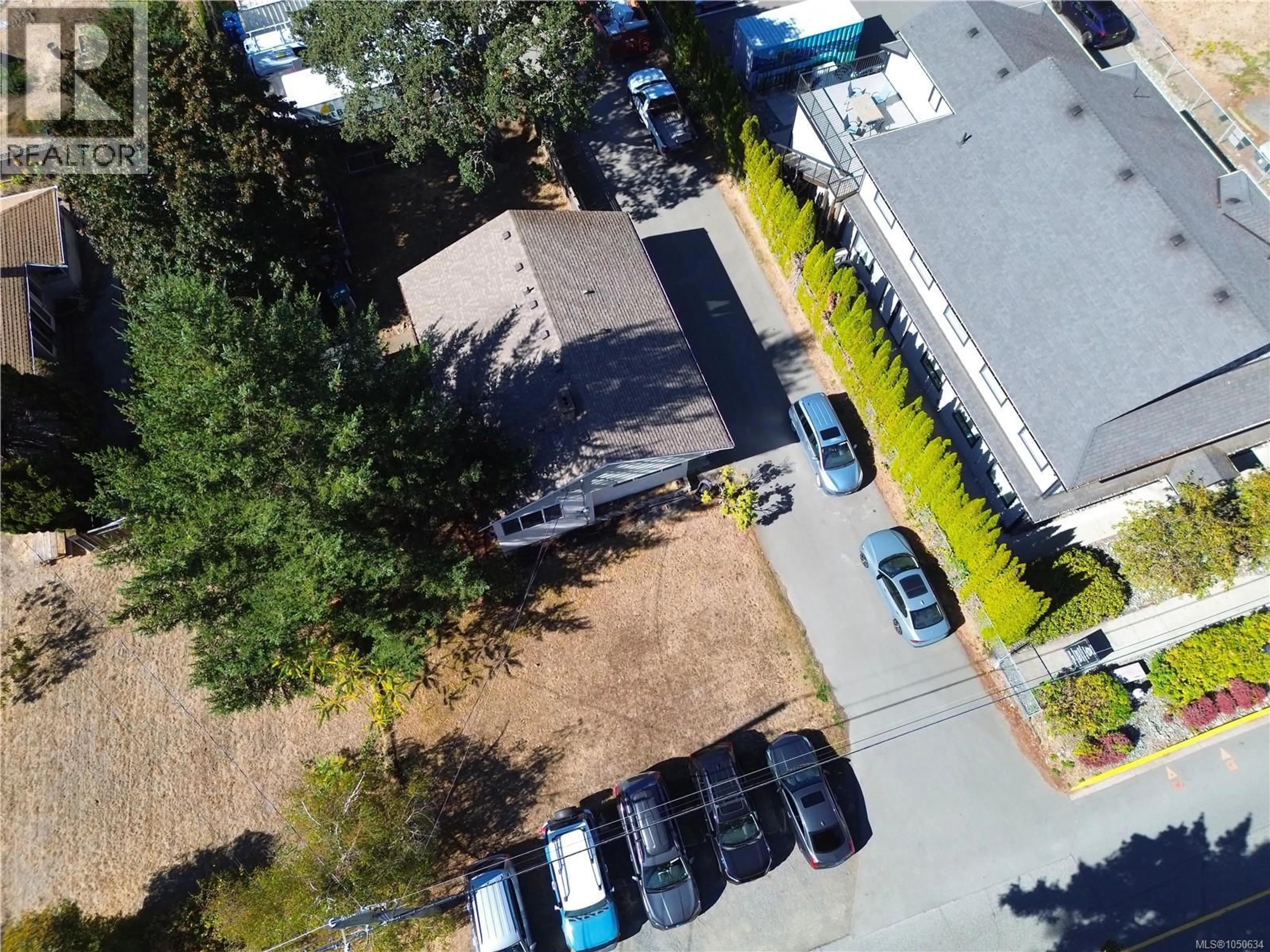 A pic from outside/outdoor area/front of a property/back of a property/a pic from drone, street for 589 LEDSHAM ROAD, Colwood British Columbia V9C1J9