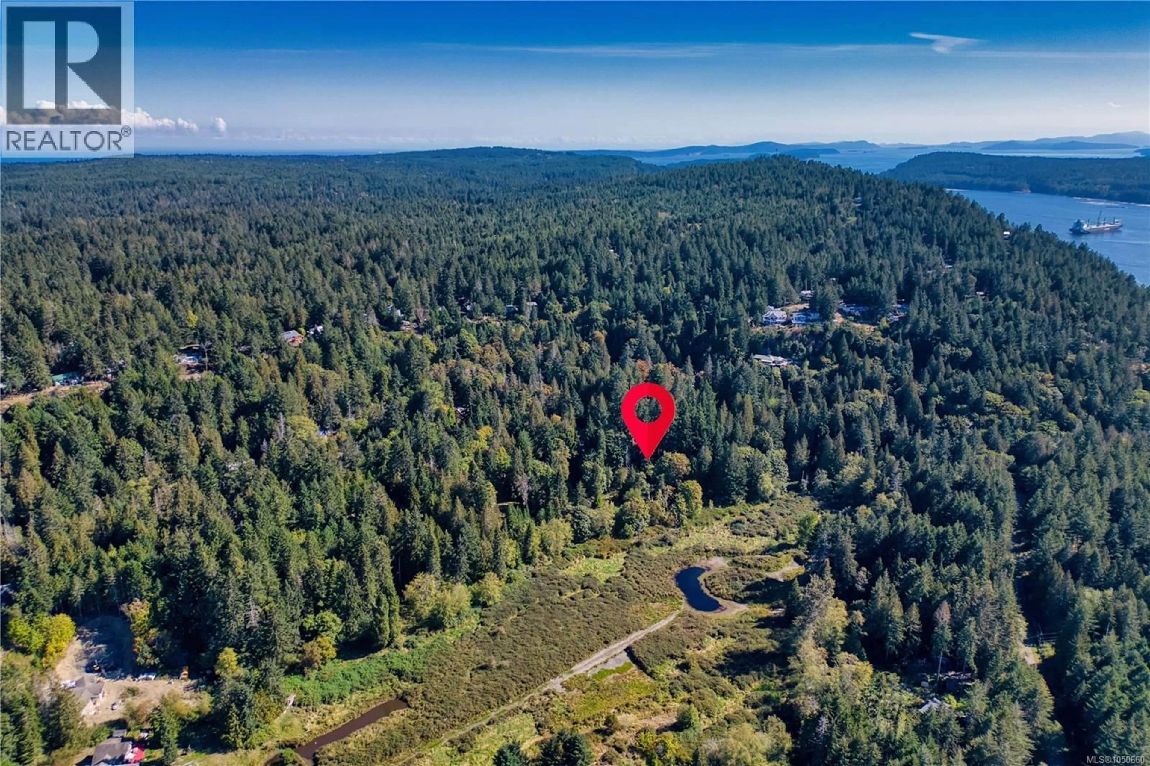 A pic from outside/outdoor area/front of a property/back of a property/a pic from drone, forest/trees view for 291 JOLLY CLOSE, Gabriola Island British Columbia V0R1X2
