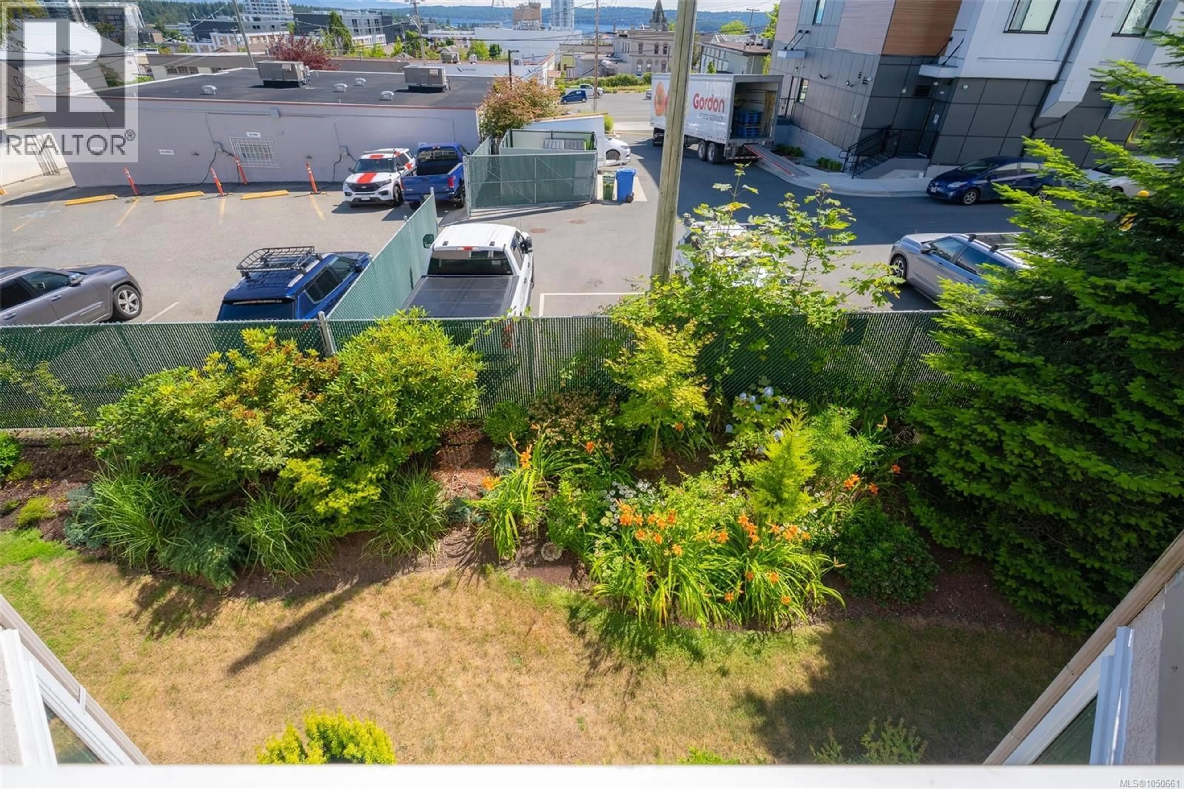 A pic from outside/outdoor area/front of a property/back of a property/a pic from drone, city buildings view from balcony for 305 - 240 MILTON STREET, Nanaimo British Columbia V9R2K6