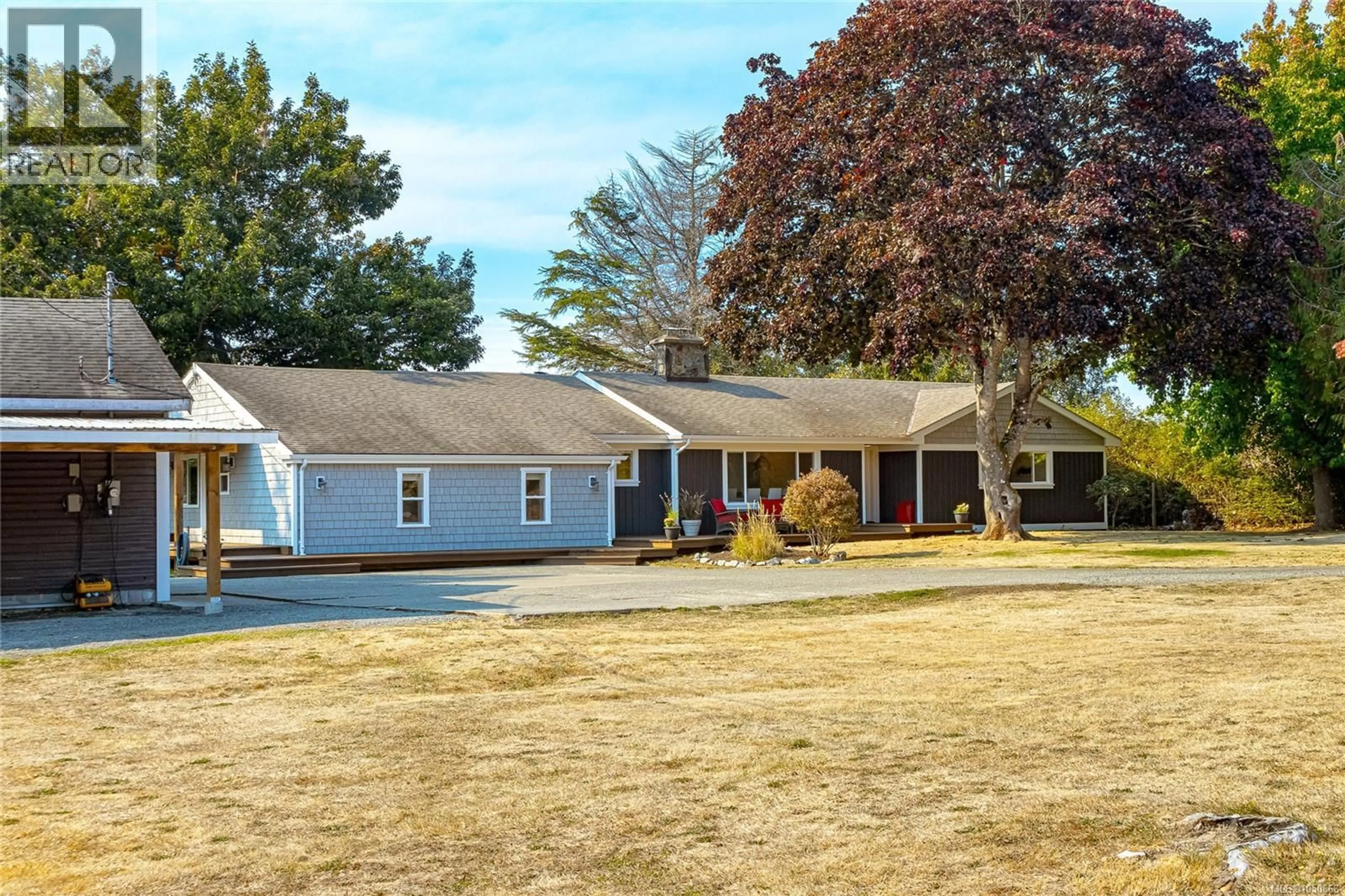 Home with vinyl exterior material, street for 6390 WELCH ROAD, Central Saanich British Columbia V8M1W7