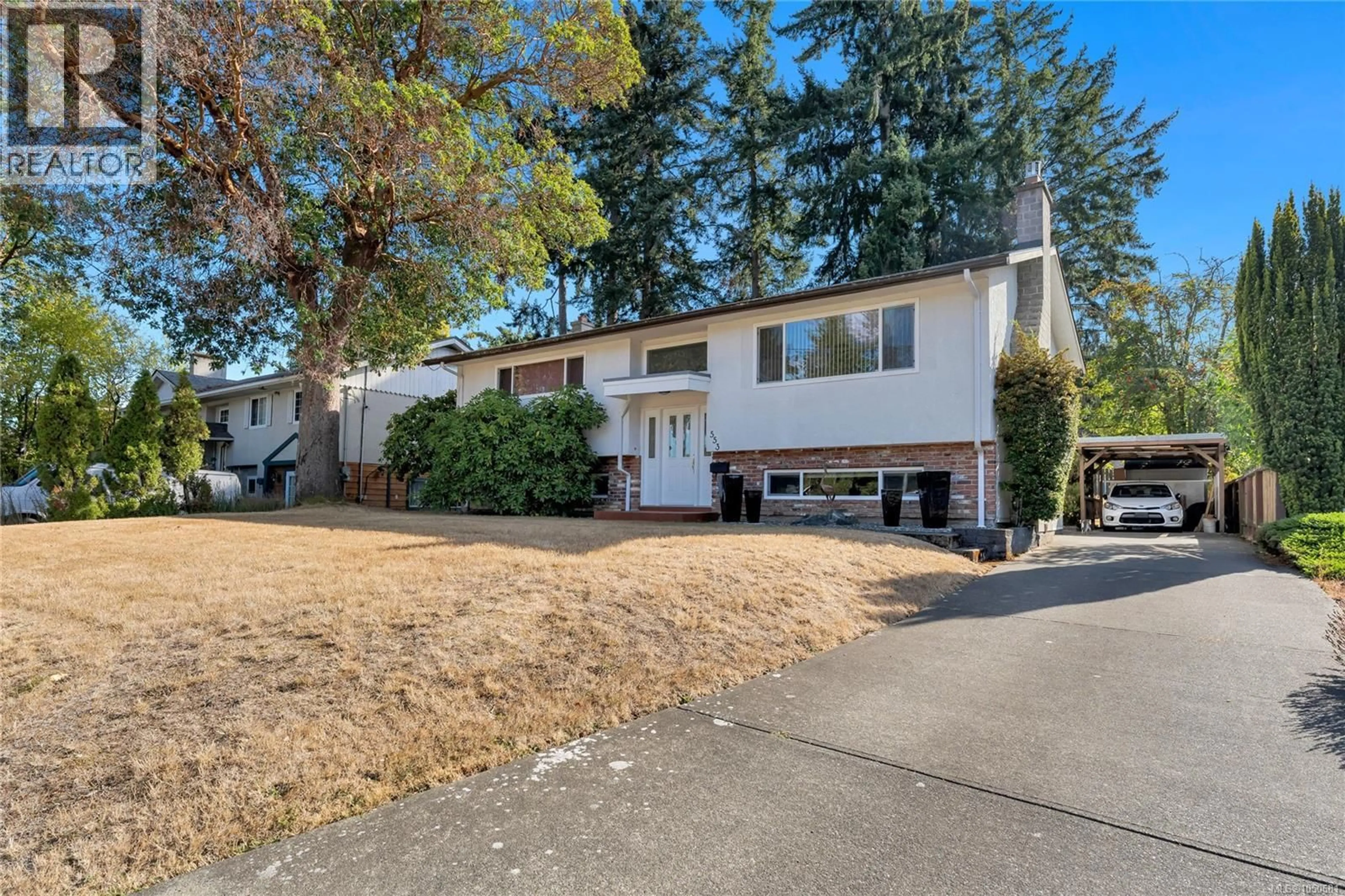 Home with vinyl exterior material, street for 553 ACLAND AVENUE, Colwood British Columbia V9C2N5