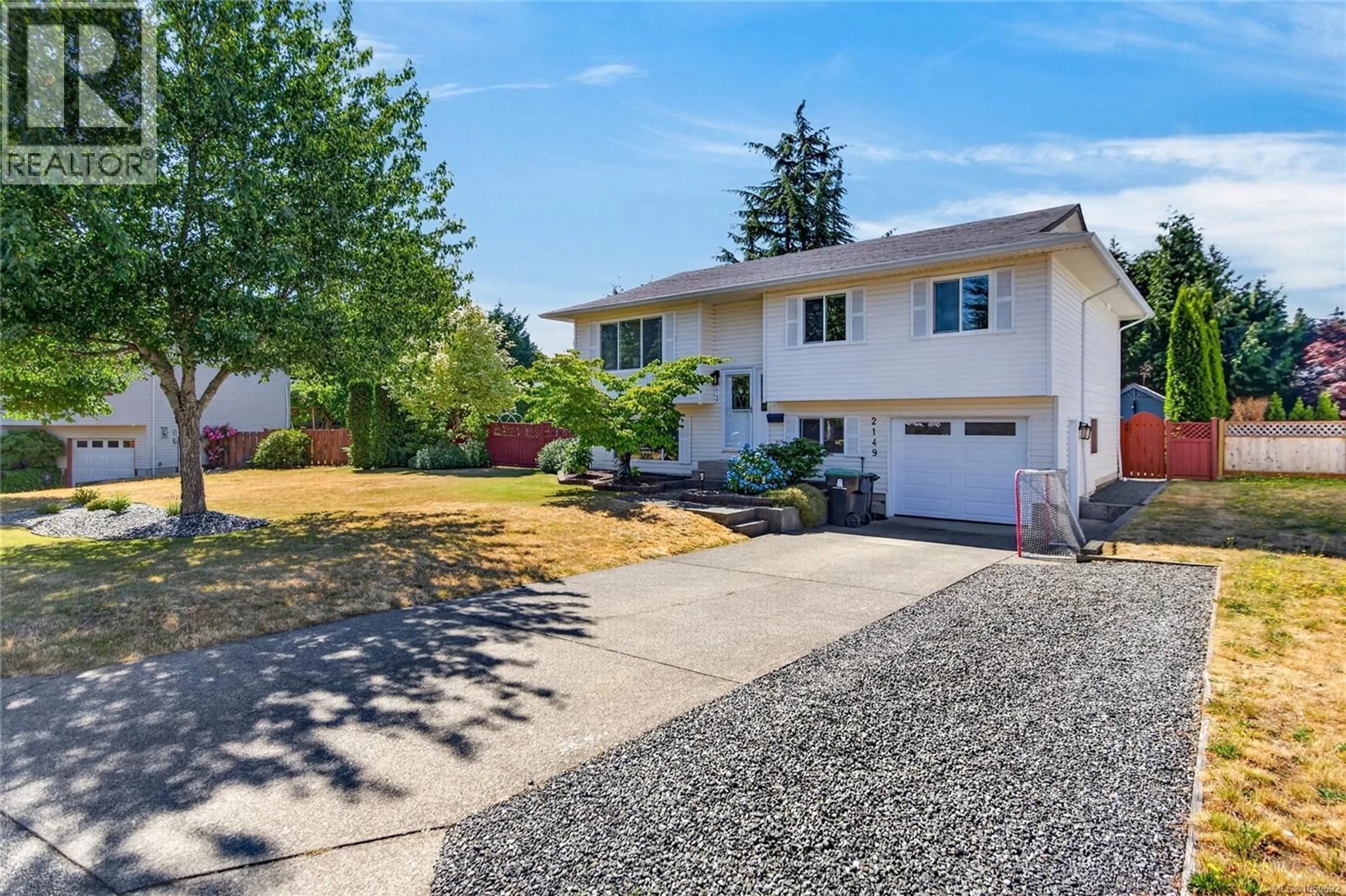 Home with vinyl exterior material, street for 2149 MURRELET DRIVE, Comox British Columbia V9M3P5