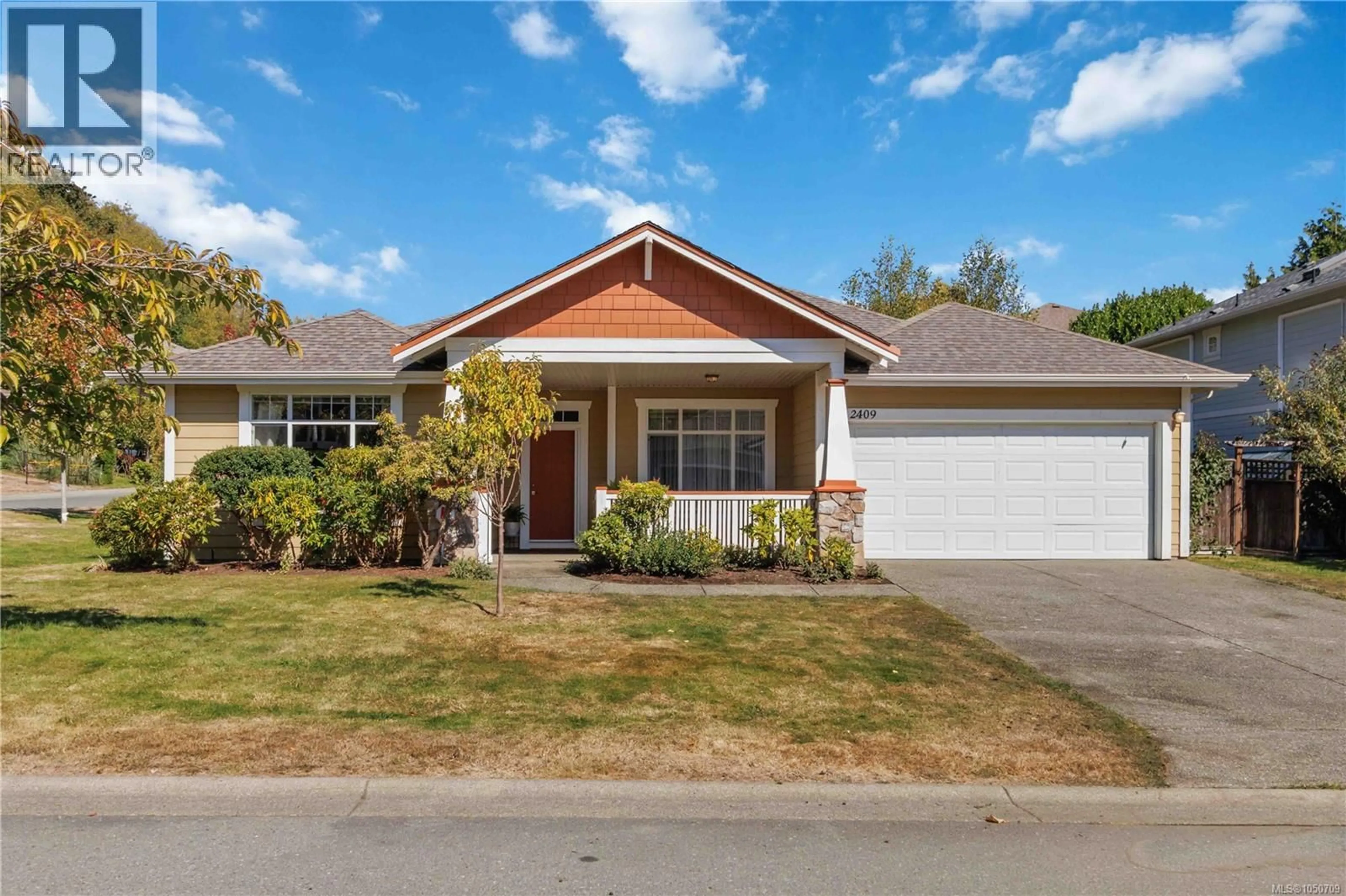 Home with vinyl exterior material, street for 2409 POPLAR DRIVE, Sooke British Columbia V9Z0Y5