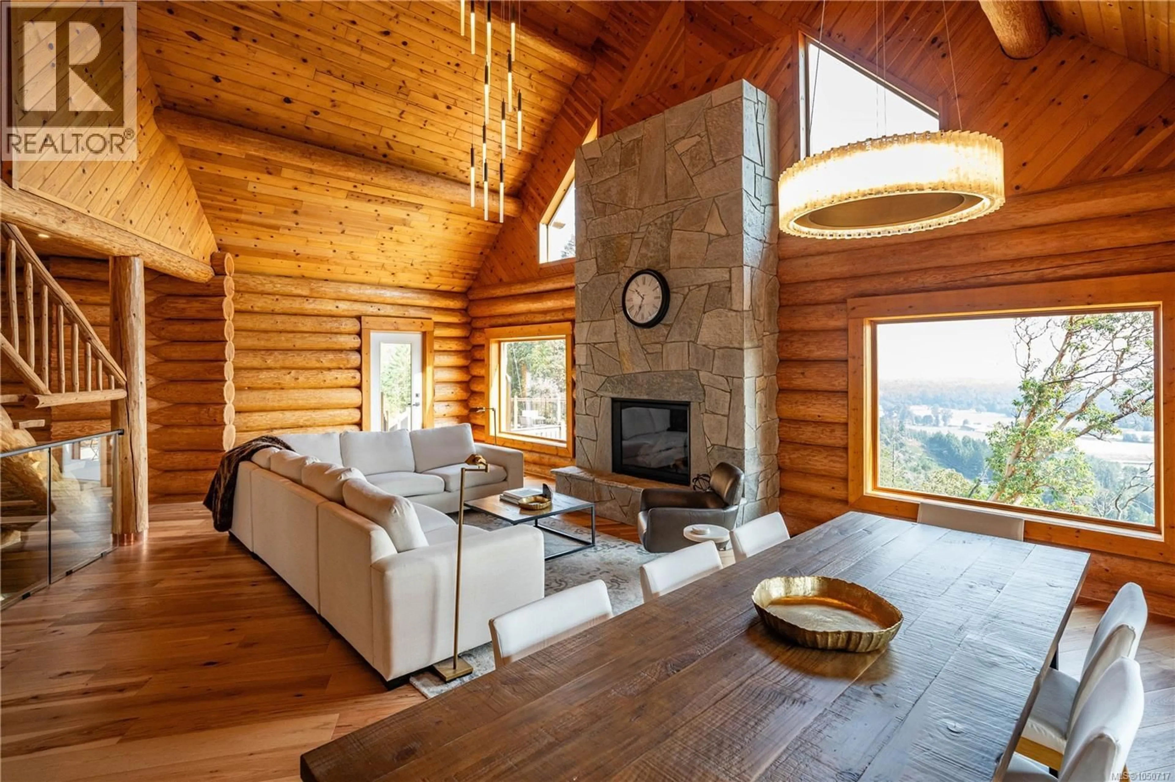 Living room with furniture, wood/laminate floor for 8030 TRANS CANADA HIGHWAY, Duncan British Columbia V9L3R9