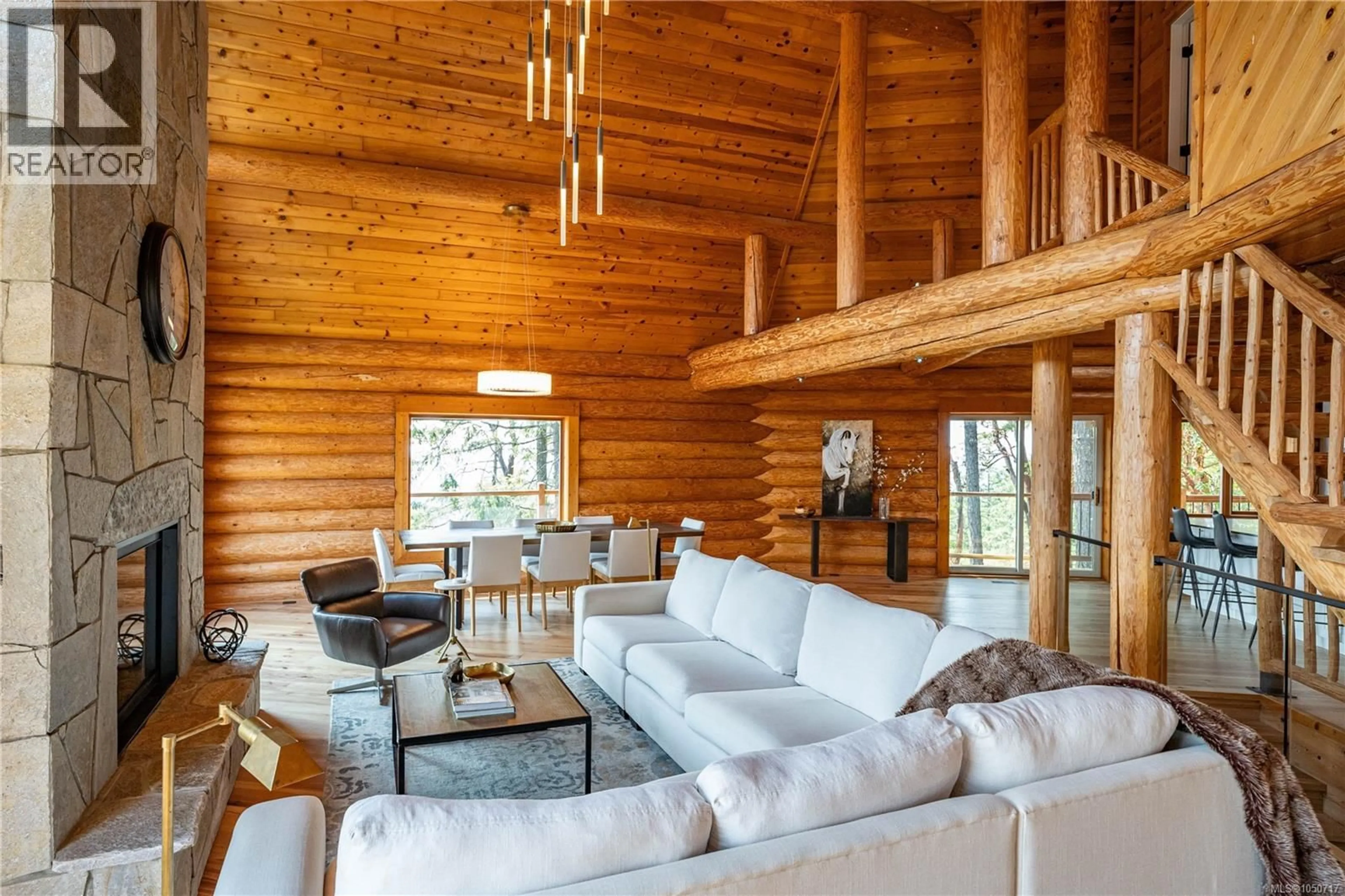 Living room with furniture, wood/laminate floor for 8030 TRANS CANADA HIGHWAY, Duncan British Columbia V9L3R9