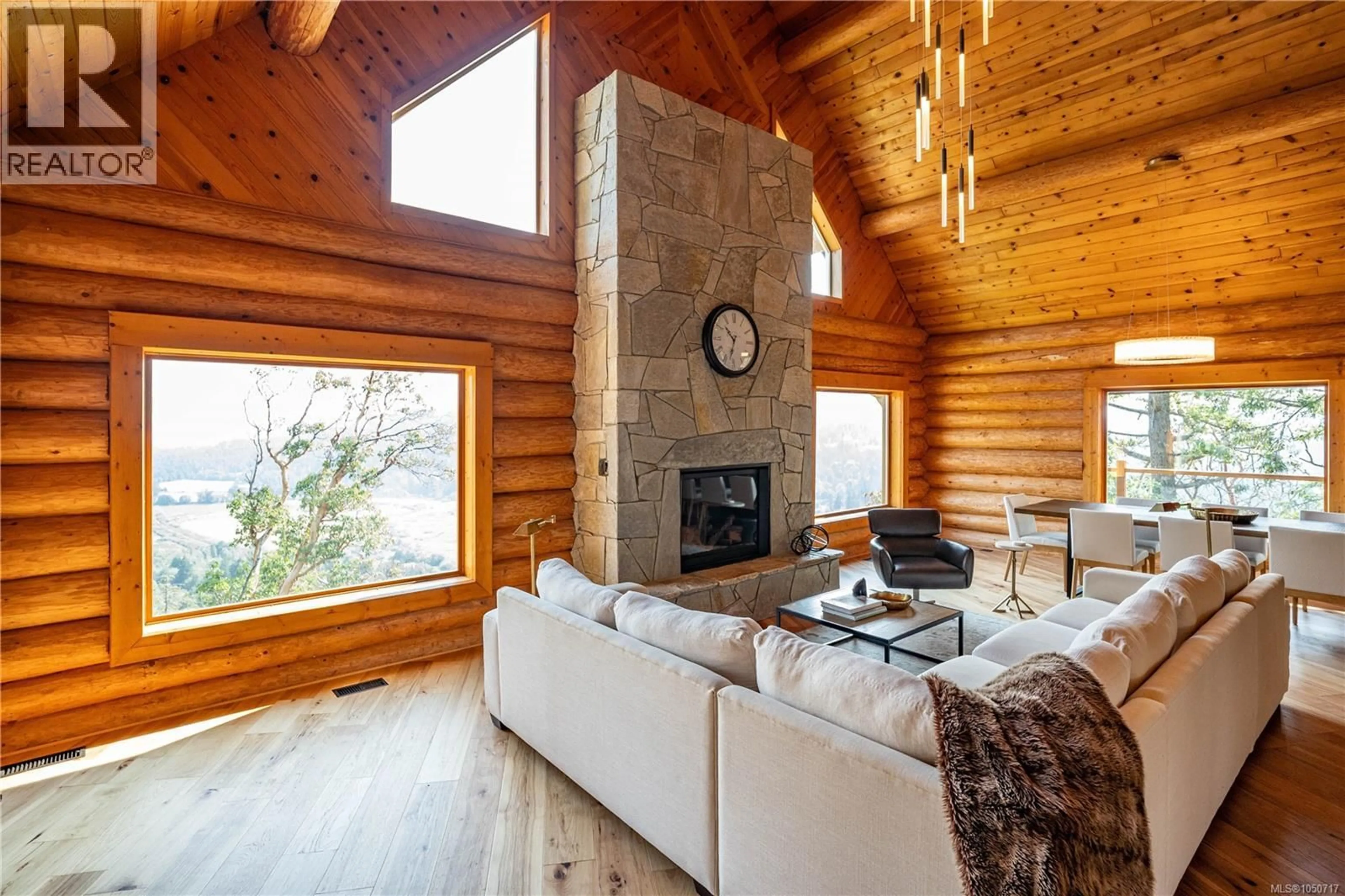 Living room with furniture, wood/laminate floor for 8030 TRANS CANADA HIGHWAY, Duncan British Columbia V9L3R9