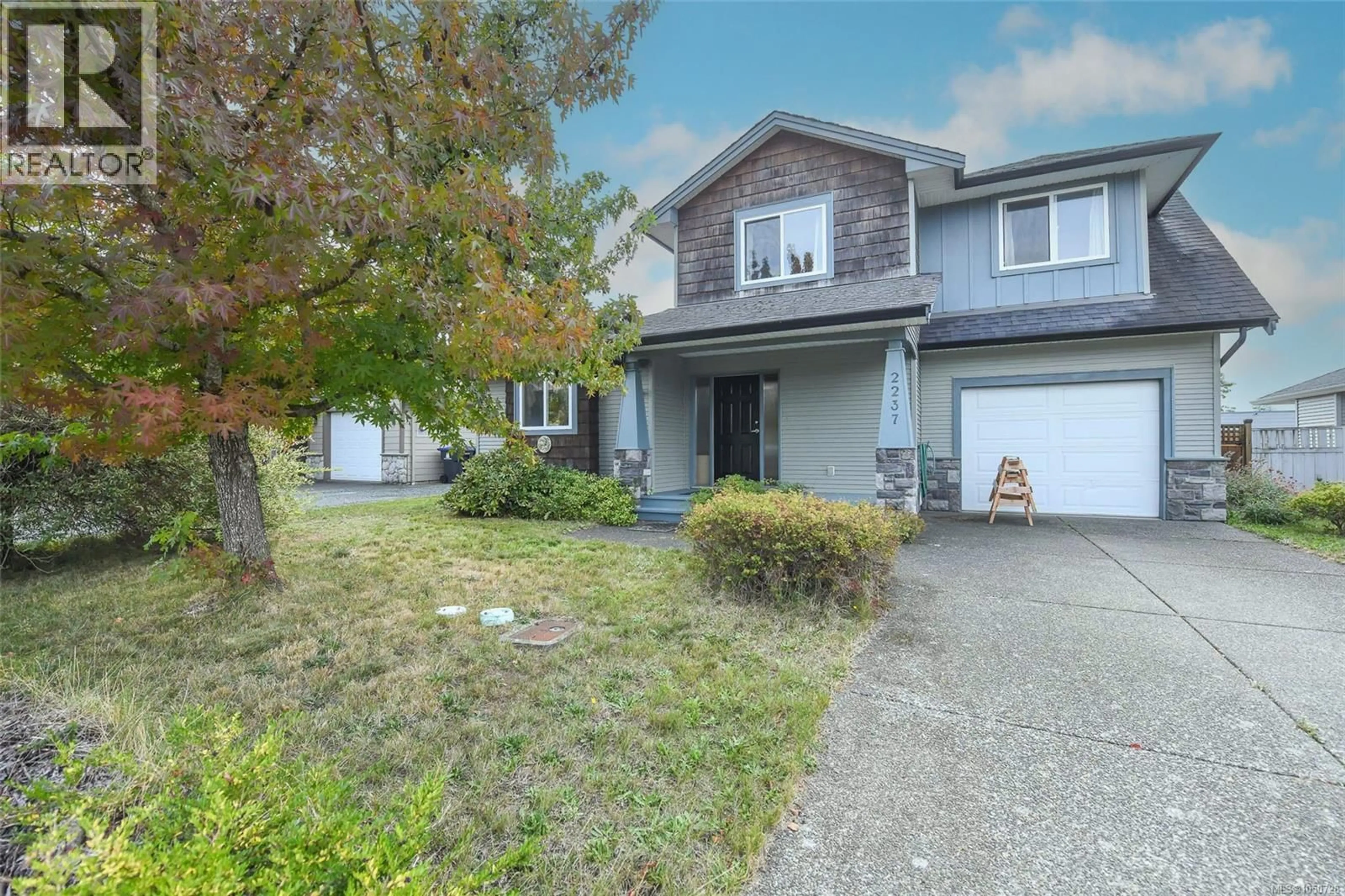 Home with vinyl exterior material, street for 2237 NEPTUNE WAY, Comox British Columbia V9M4E8