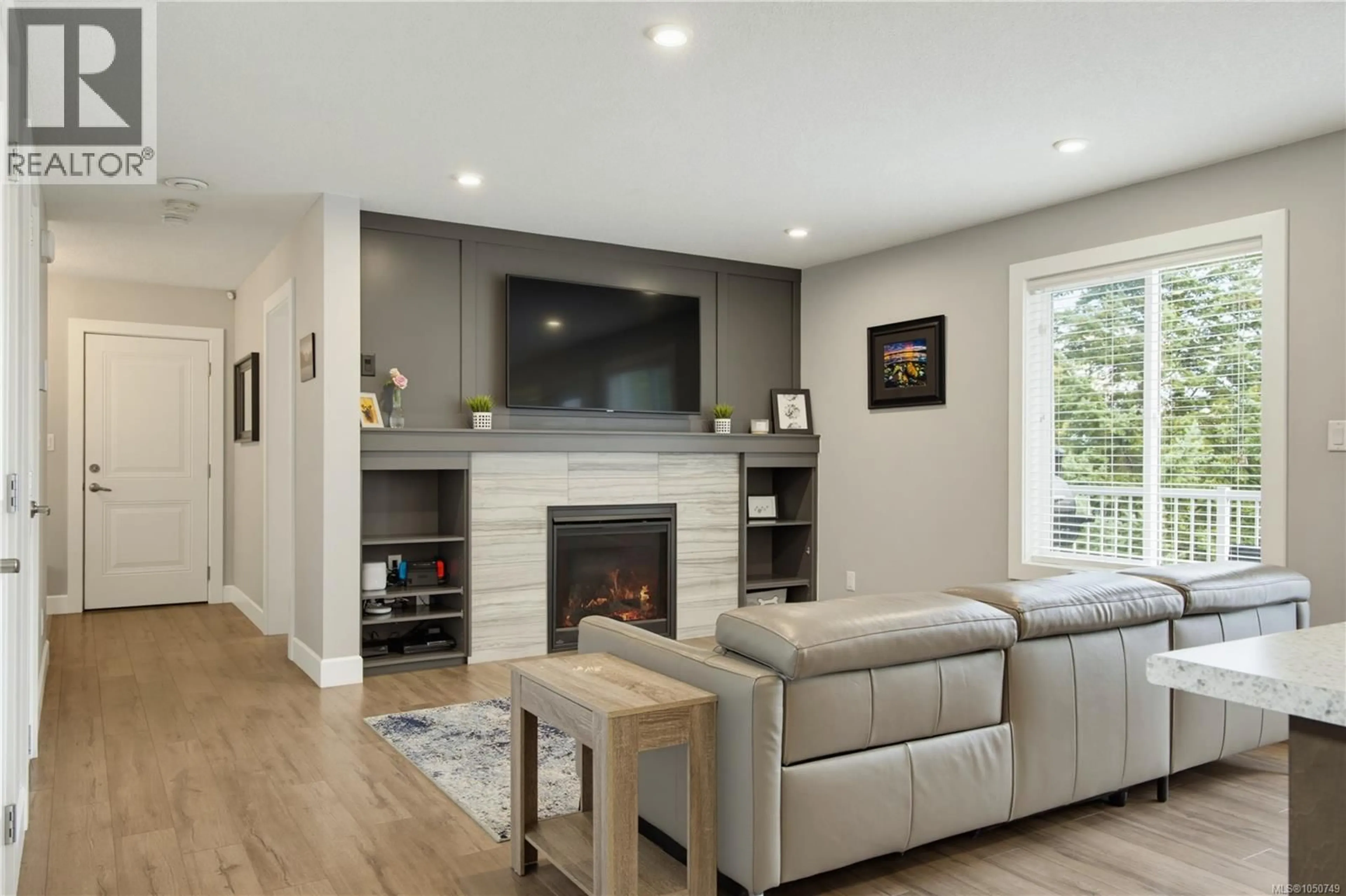Living room with furniture, wood/laminate floor for 2364 EXTENSION ROAD, Nanaimo British Columbia V9X0A9
