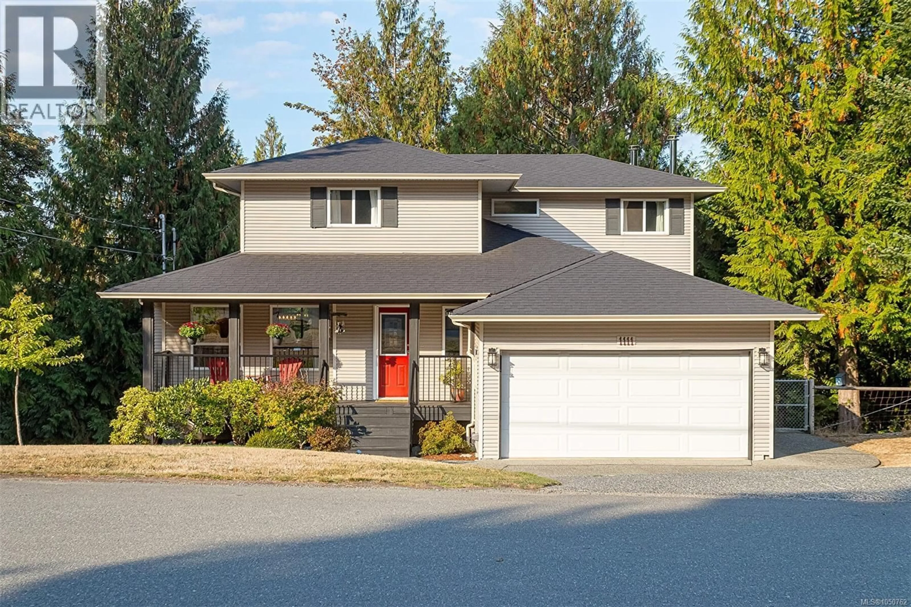 Home with vinyl exterior material, street for 1111 FERN RIDGE DRIVE, Mill Bay British Columbia V8H1A4