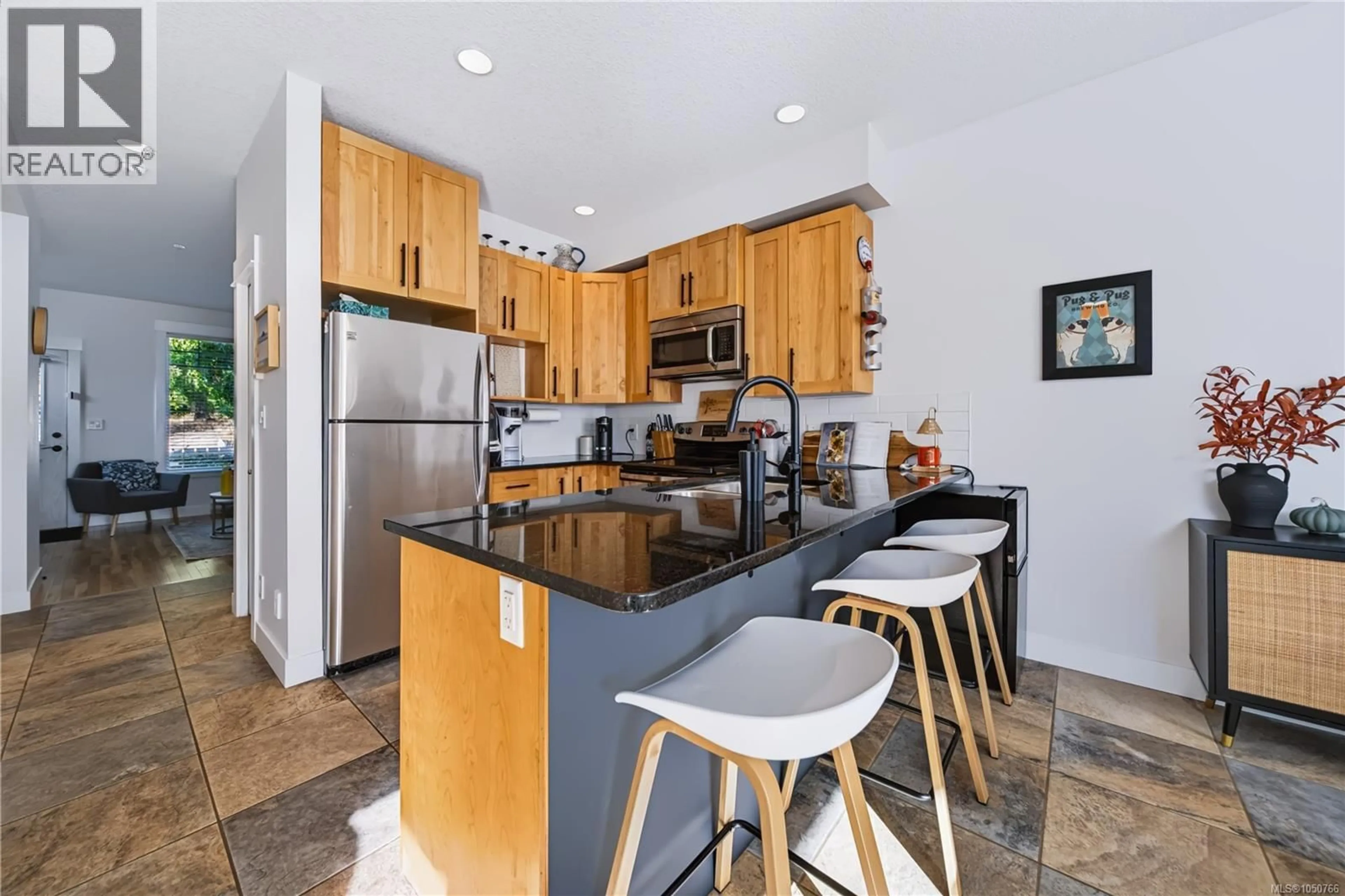 Open concept kitchen, unknown for 102 - 6057 DOUMONT ROAD, Nanaimo British Columbia V9T0G3