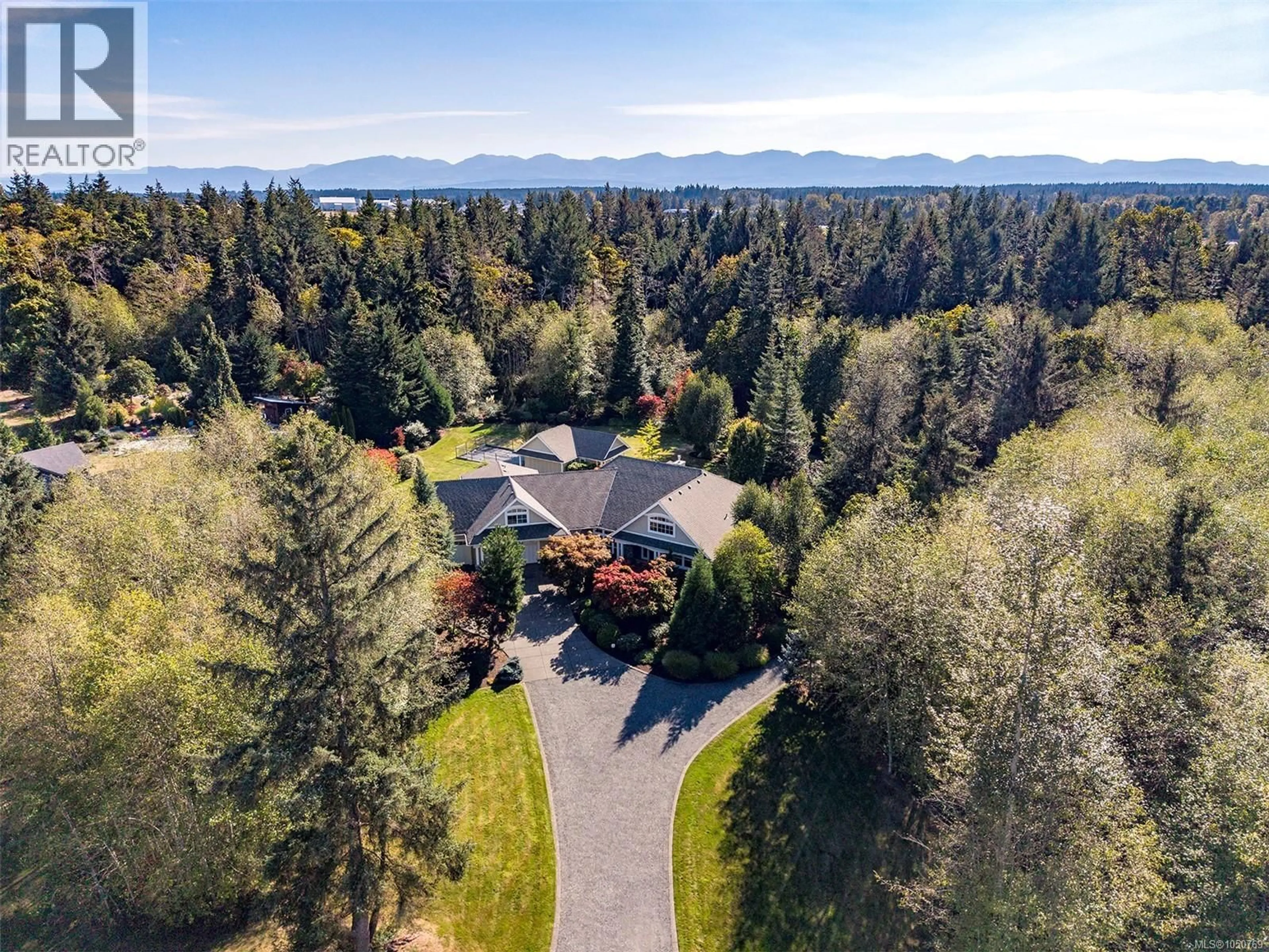 A pic from outside/outdoor area/front of a property/back of a property/a pic from drone, unknown for 1063 KINCORA LANE, Comox British Columbia V9M4C5