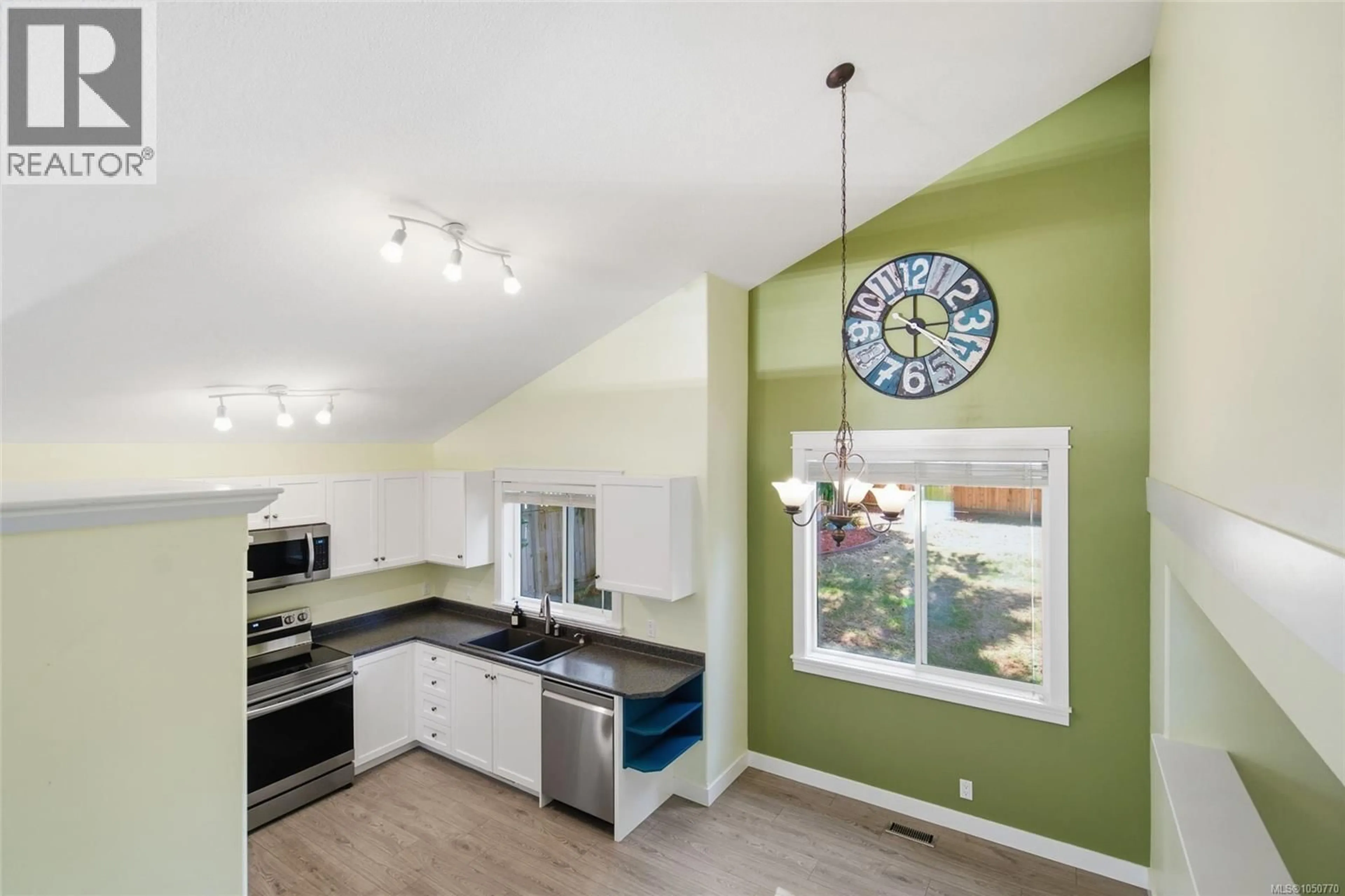 Open concept kitchen, ceramic/tile floor for 4310 ASHBURY PLACE, Nanaimo British Columbia V9T5S3