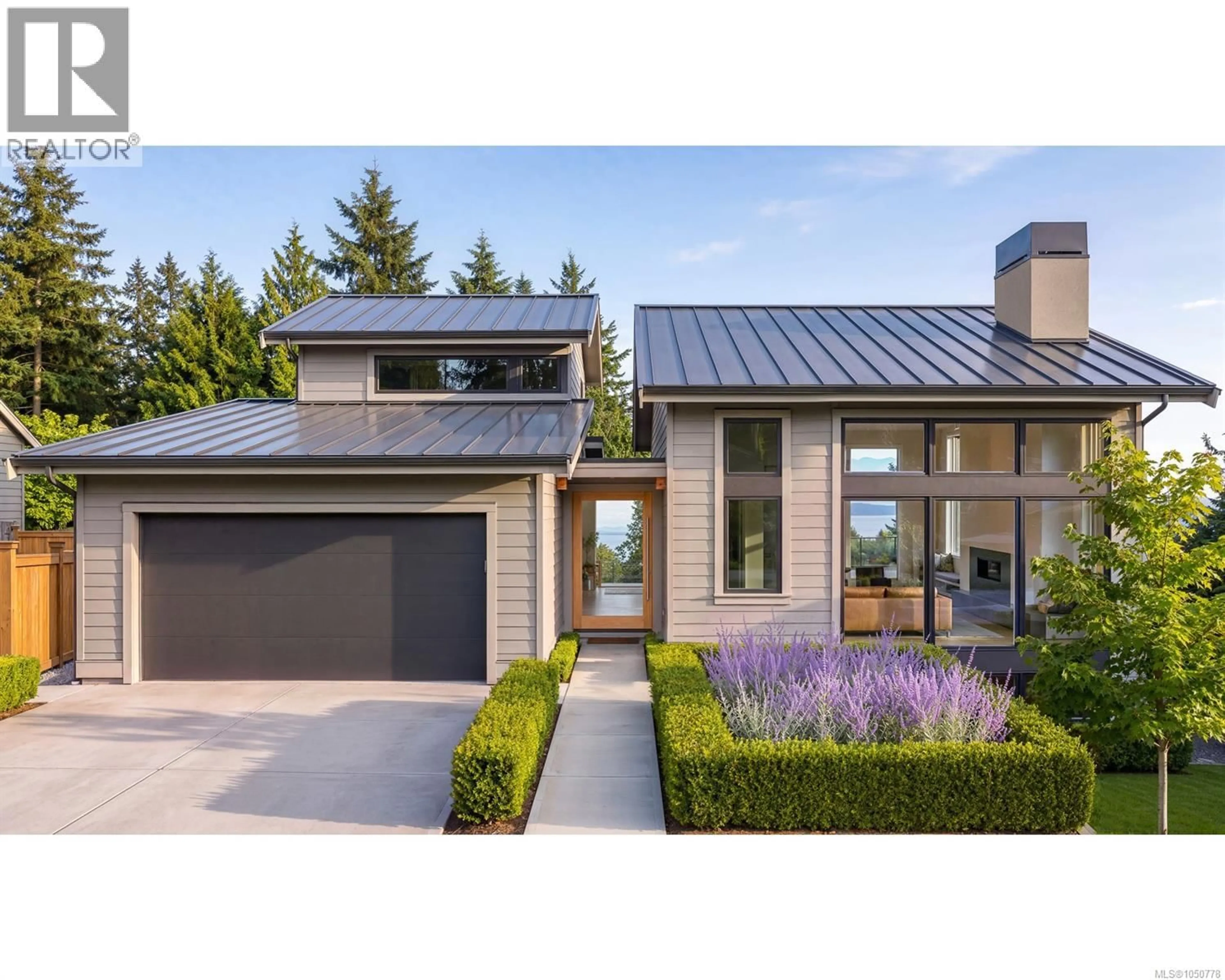 Home with brick exterior material, street for 135 SUNNINGDALE ROAD WEST, Qualicum Beach British Columbia V9K1L1
