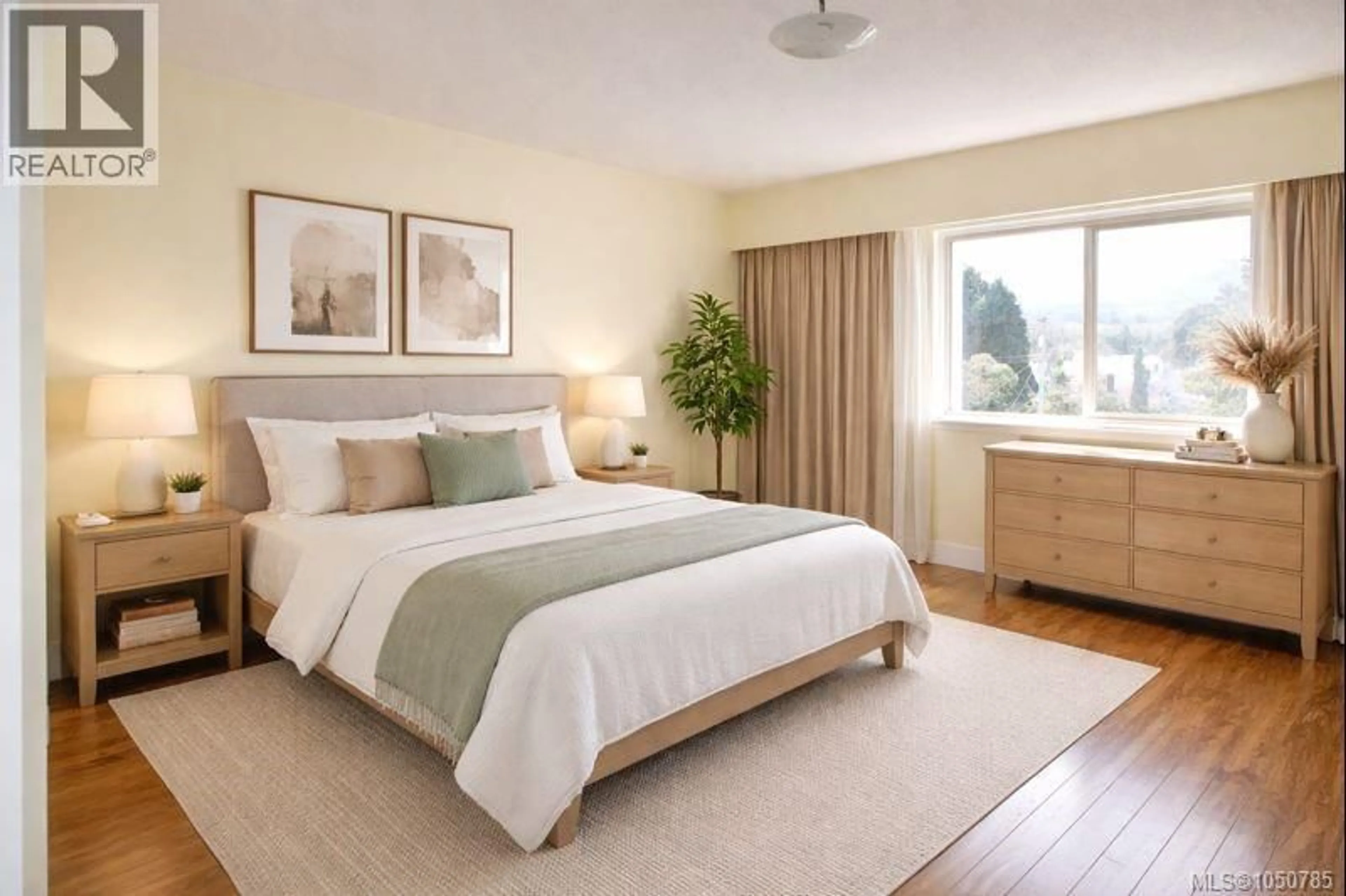 Bedroom with bed, wood/laminate floor for 704 - 33 MT. BENSON STREET, Nanaimo British Columbia V9S5L2