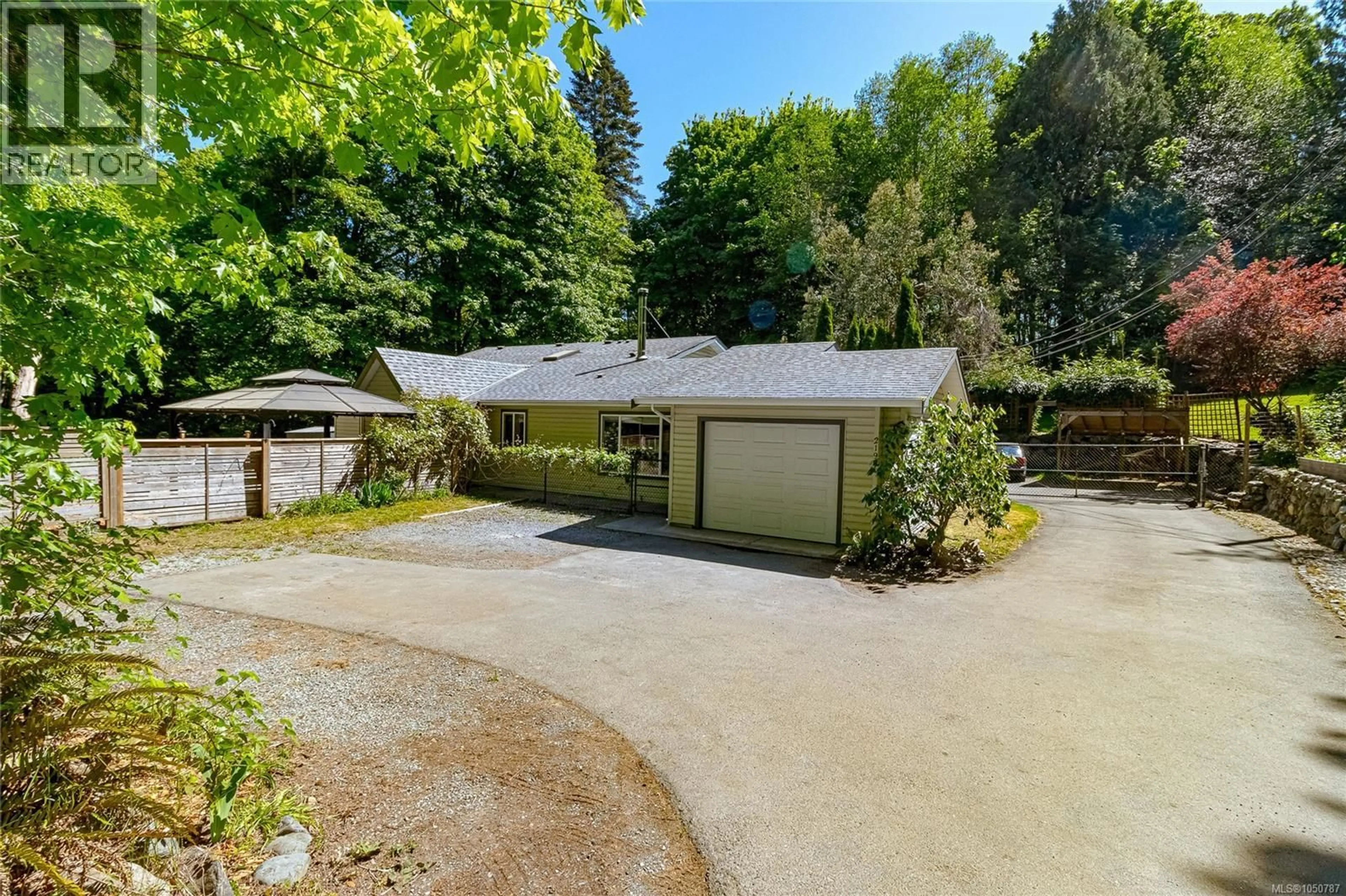 A pic from outside/outdoor area/front of a property/back of a property/a pic from drone, street for 2196 PHILLIPS ROAD, Sooke British Columbia V9Z0Y3